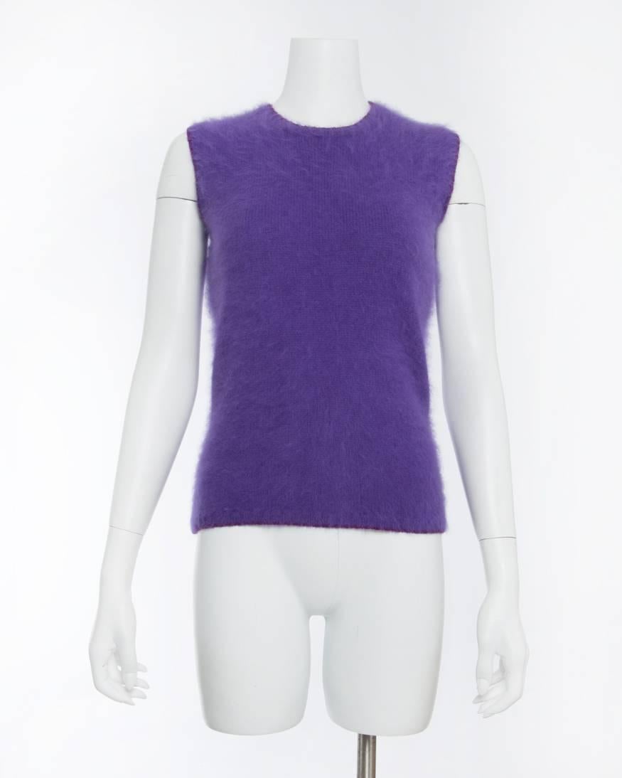 Vintage 1990’s Gianni Versace Purple Angora Sleeveless Top.  Pullover sweater knit with rounded neckline and straight cut body. Marked size IT 40 but can fit larger and is best for USA size 6/8 or overall size M.  Garment bust measures 36” when laid