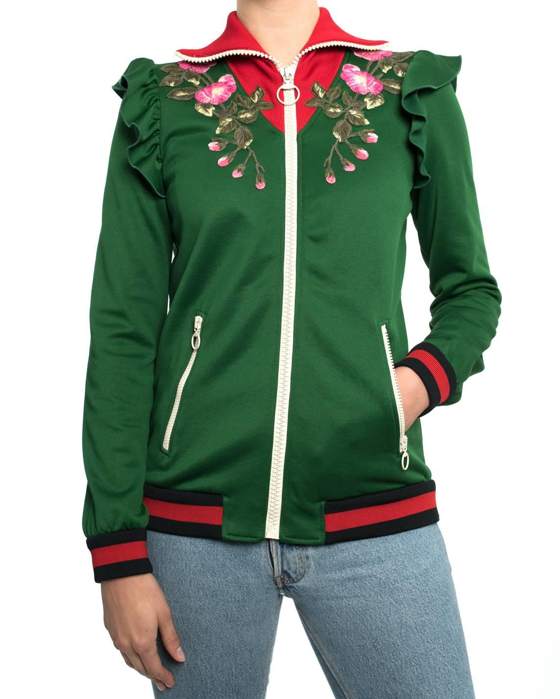 Gucci Green Zip Front “Hollywood” Tiger Track Jacket.  Designed by Alessandro Michele for the Pre-fall 2017 runway collection and ad campaign.  White zippers, navy and red striped hem and cuffs, floral embroidered patches. Marked size S.  Garment
