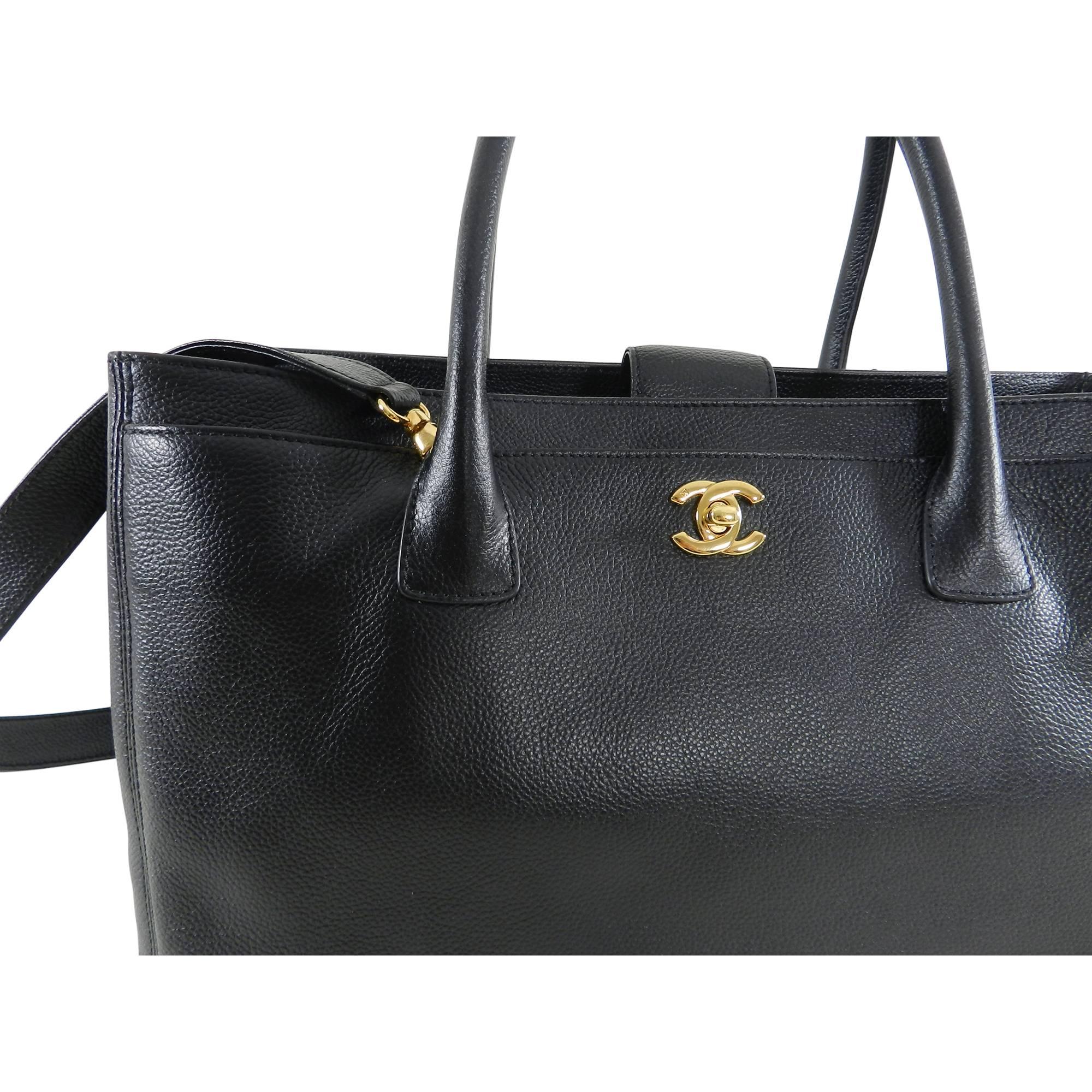 Chanel Black Executive Cerf Tote Bag Gold Hardware. This discontinued bag is perfect for work or play. Black grained calf leather, gold-tone CC logo turn clasp, shoulder strap.  Very excellent condition - only carried a few times.  No flaws to note.