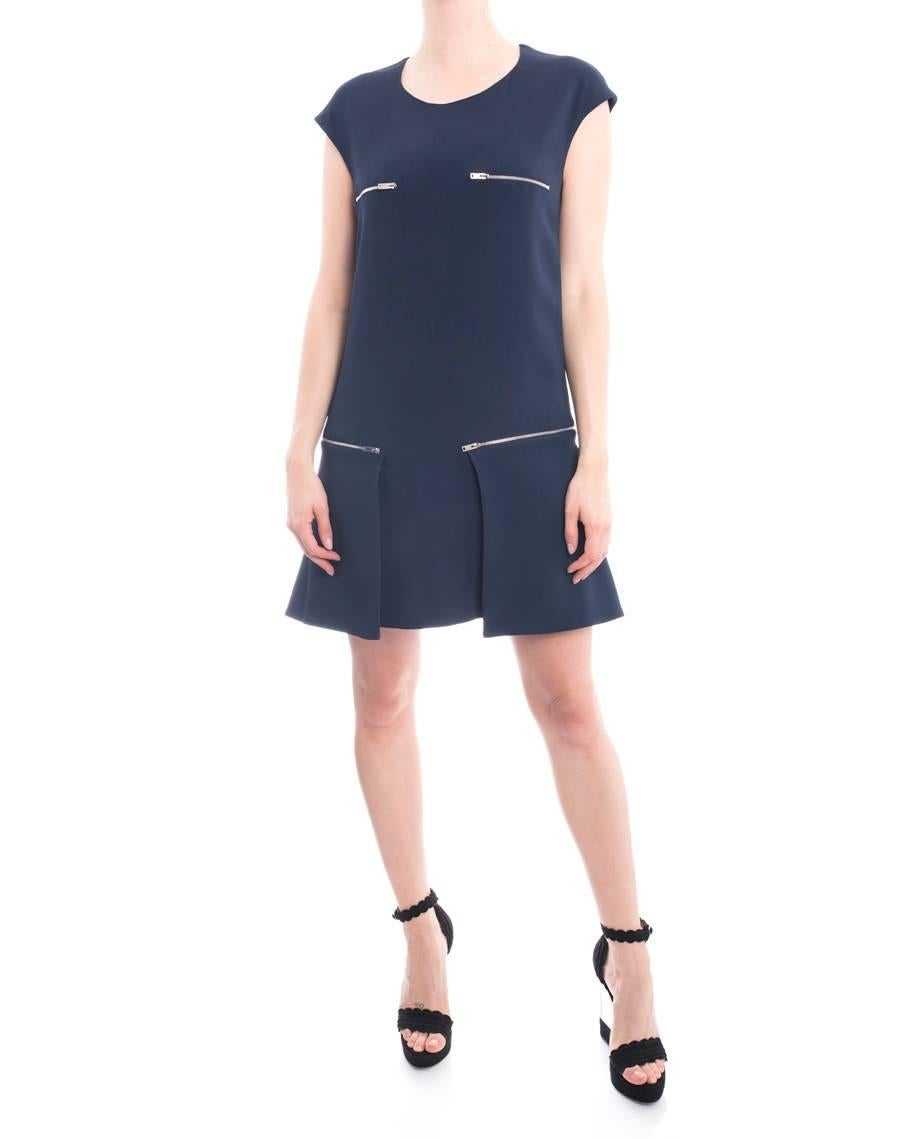 Stella McCartney Navy Sleeveless Dress with Silvertone Zippers. Pleated hem, centre back invisible zipper. Marked size IT 42 (USA 6). Garment bust measures 36” and is recommended to be worn by 34” bust person for ease of movement. Garment waist is