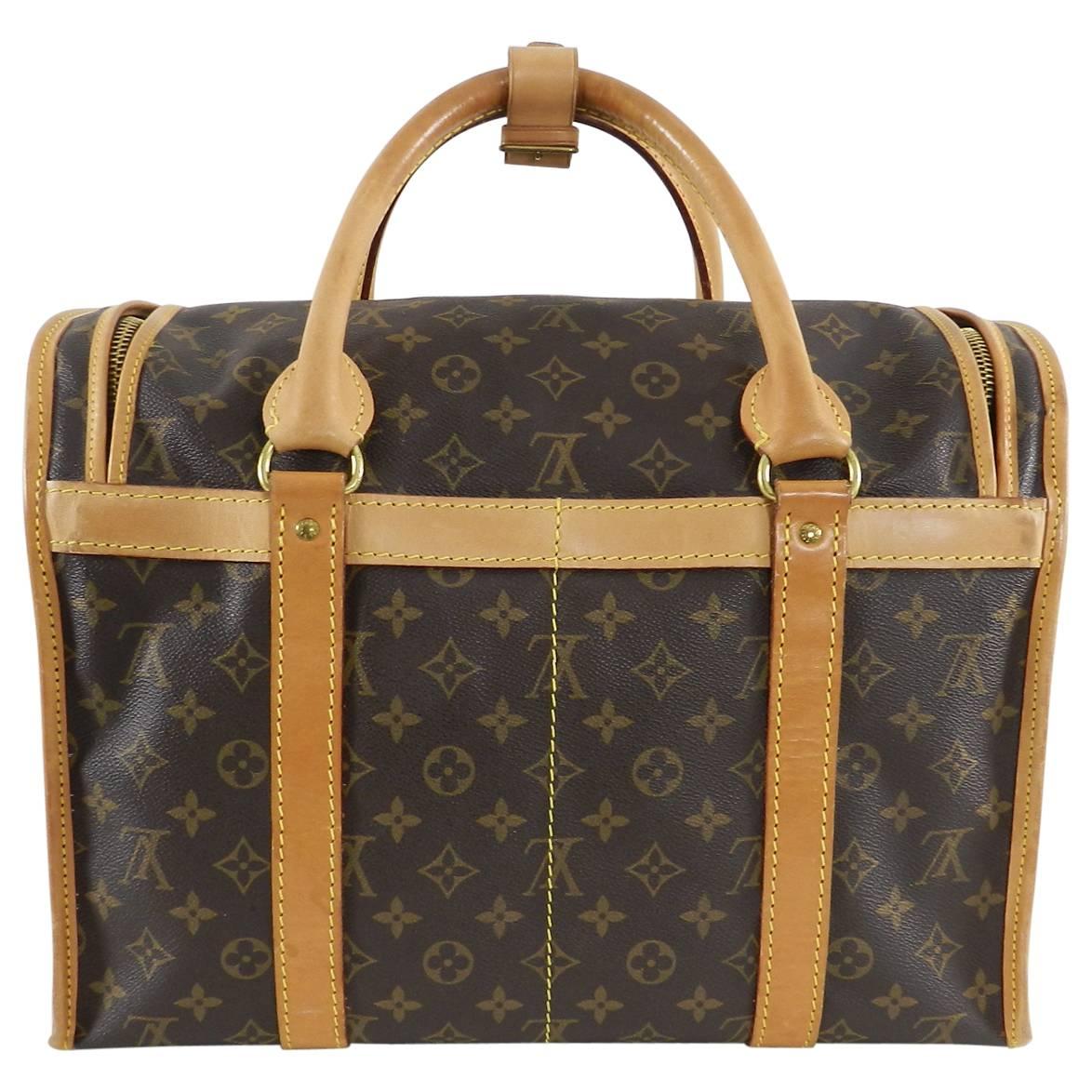 Louis Vuitton Monogram Canvas Sac Chien Train Case Bag.  This is the same design as the pet carrier sac chien except it has no side window and is designed as a travel carry-on train case and not a pet carrier. Vintage Monogram canvas bag with double