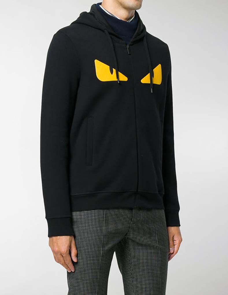 Fendi Monster Black Hoodie Sweatshirt with Yellow Eyes.  $1390 original retail - current season. 100% authentic.  Long sleeved sweatshirt with hood.  Pockets on the sides and front zipper with double slider.  Yellow bag bug eyes.  Marked size IT 48