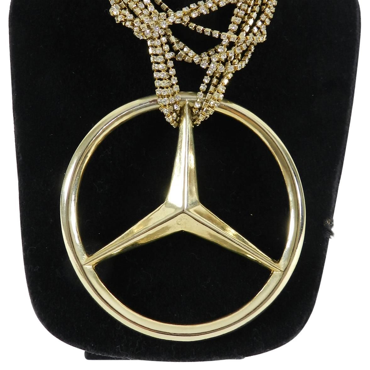Tom Binns “Uber Urban Mercedes” Statement Necklace.  $2987 CAD original retail. Tom Binns has collaborated with many designers including Malcolm McLaren and Vivienne Westwood, and is a favourite of celebrities including Michelle Obama. This large