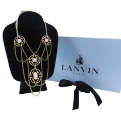 Collana Lanvin in oro e rosa con lacci a nastro