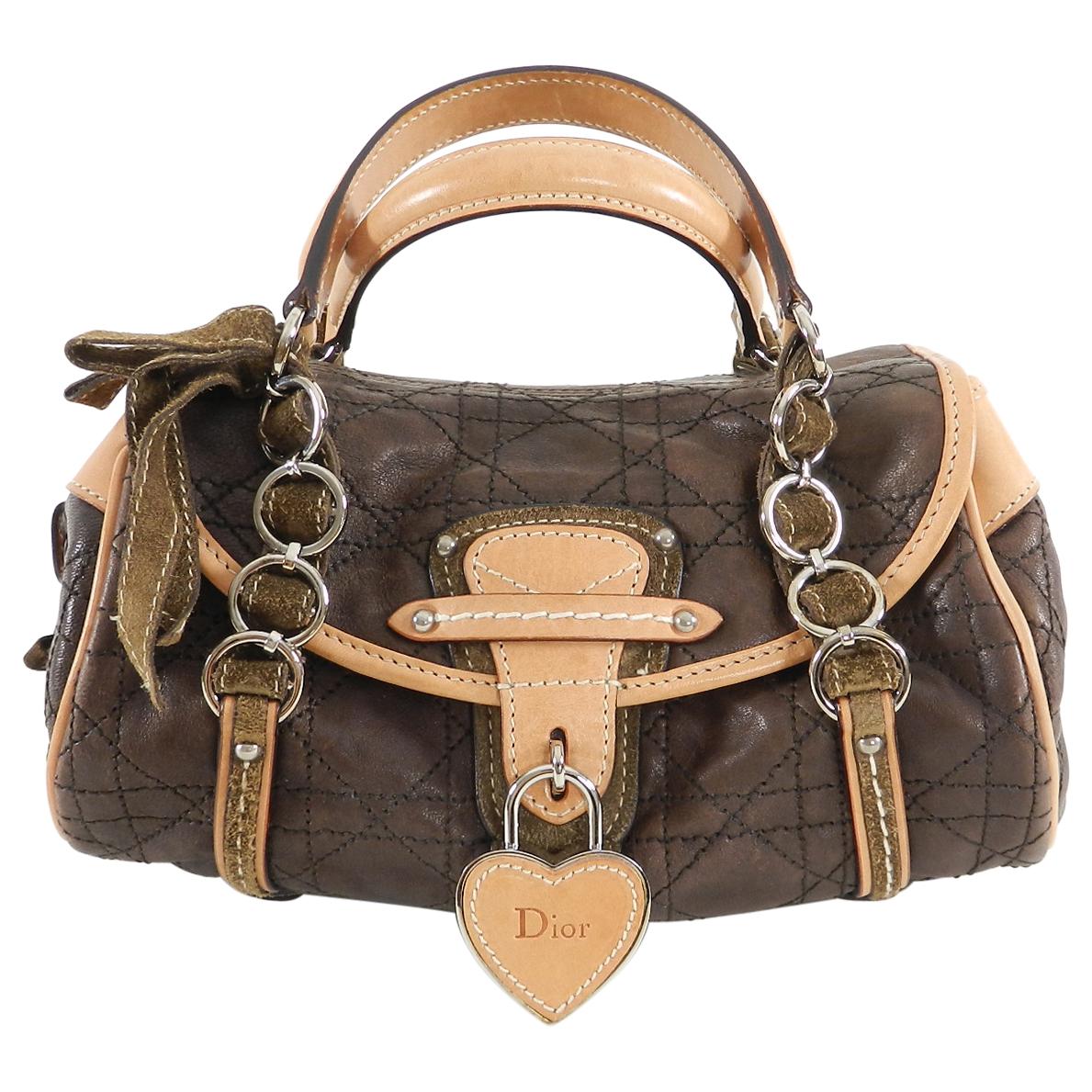 Christian Dior Brown Leather Romantique Small Bag.  From the 2006 Romantique bag collection. Dark brown cannage quilt body with double handles, suede trim, round profile, Dior logo heart padlock and key, pink satin lined interior.  Excellent