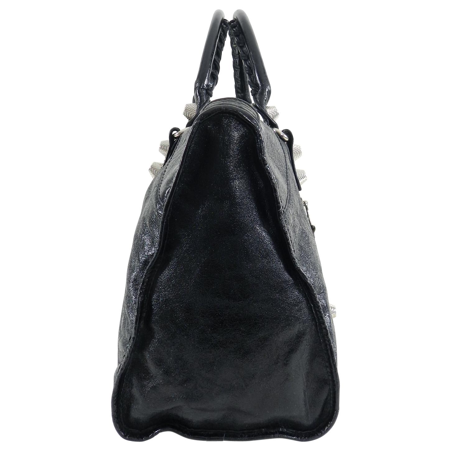 Balenciaga Black City Giant 21 Work Bag Silver Hardware.  Original retail $2095 USD. Double rolled leather laced handles, large silvertone studs, top zipper, attached mirror.  Measures 17.5 x 10.75 x 7 inches.  Serial code 173082 200047.  Excellent