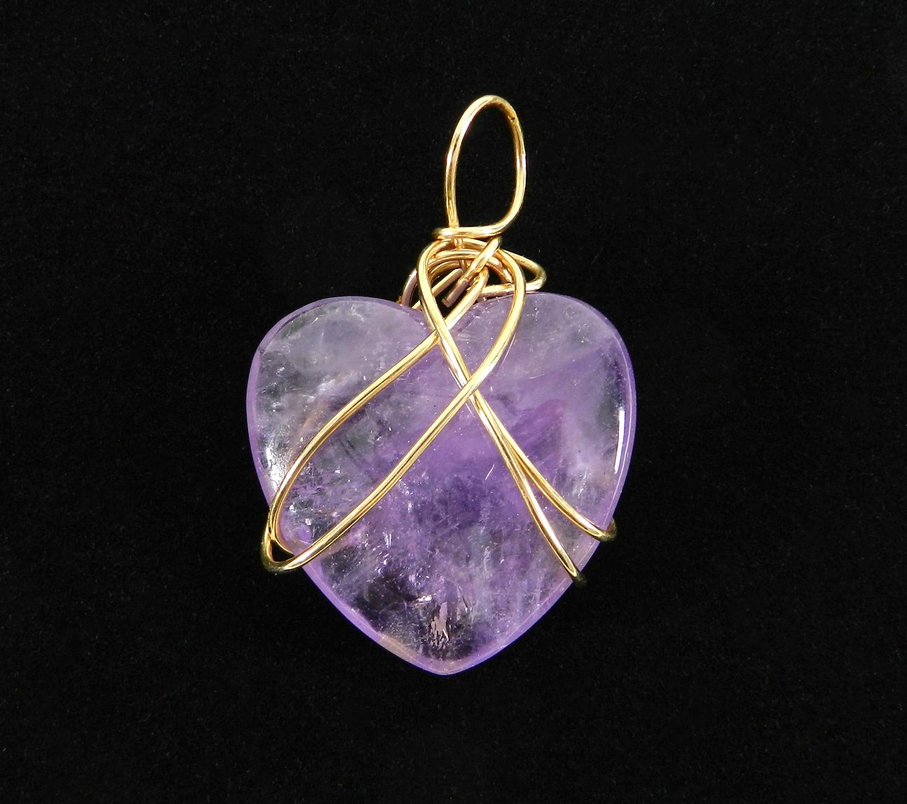 Kazuko Oshima 14K Gold-filled Wire and Purple Amethyst Heart Pendant.  Sold exclusively by Barney’s in New York, Kazuko jewelry was popular with celebrities including Bianca Jagger.  Her characteristic designs included semi-precious stones wrapped