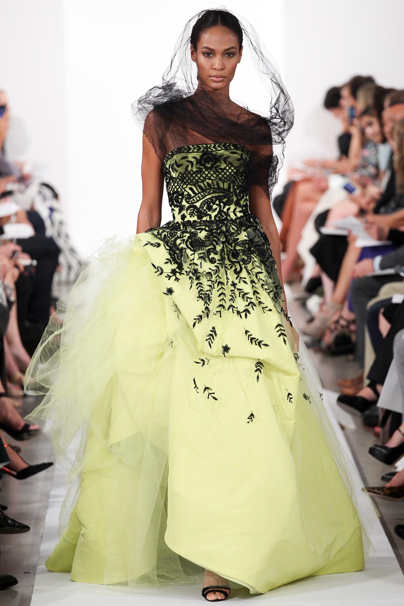Oscar de la Renta Spring 2014 Runway Chartreuse Yellow Tulle Gown.  Strapless design with gathered hem and black embroidery.  Centre back zipper and fully boned interior bodice.  Garment is tagged size USA 6 but runs small and is best for a USA 4. 
