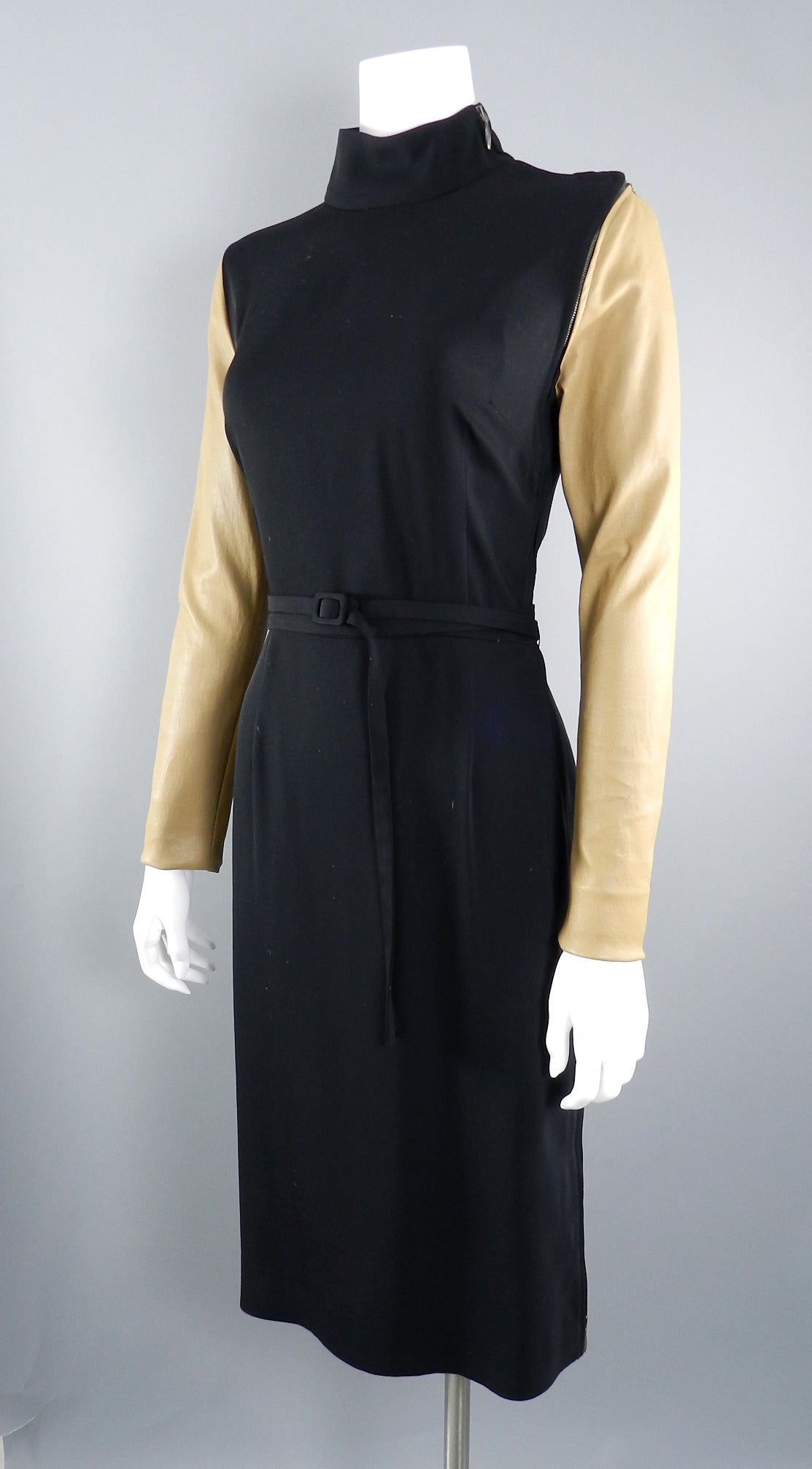 Maison Martin Margiela black dress with tan stretch leather sleeves. Tagged size IT 42 (USA 6). Will fit 34/35