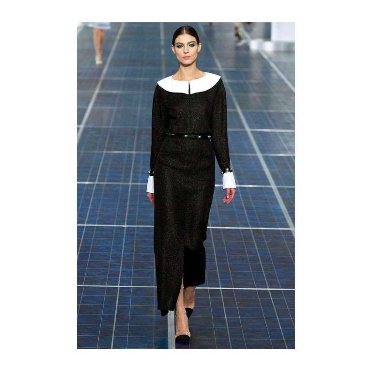 Chanel Spring 2013 Runway and Ad Campaign collection long black gown. Detachable white collar and cuffs, black shimmer fabric, pearly CC buttons at cuffs, pockets at front hip and rear. Excellent condition - worn once and professionally cleaned
