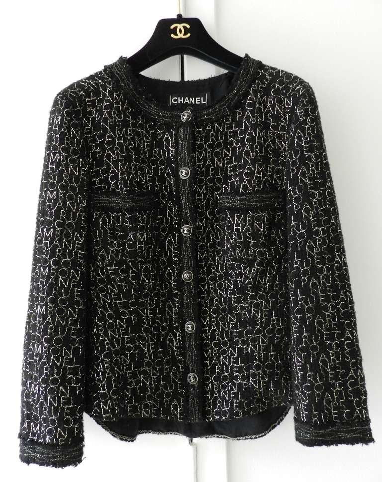 Chanel 2007 Spring, black jacket with silver metallic embroidered logo design. 
