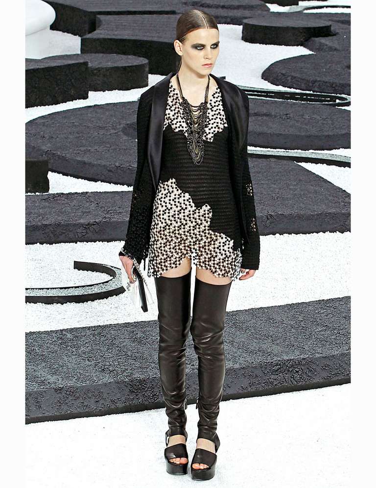 Chanel 2011 Spring runway collection tank and jacket 2pc set. In addition to the tank shown, we also have a longer matching tank as shown exactly on runway is available at separate cost. Black and white sheer square lace, satin collar, knit jersey