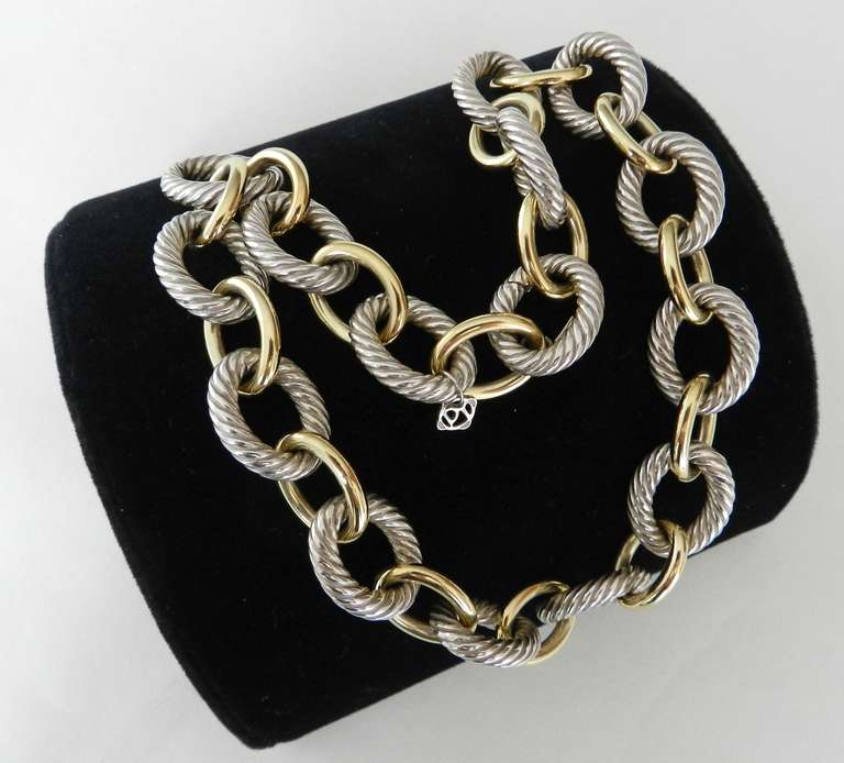 David Yurman XL Oval Links Sterling 18K Necklace.  Original retail $3950+. Sterling silver and 18k yellow bonded gold. 23mm wide. Excellent condition.

Shipping prices provided are for FedEx Ground to the USA. For quotes on international or