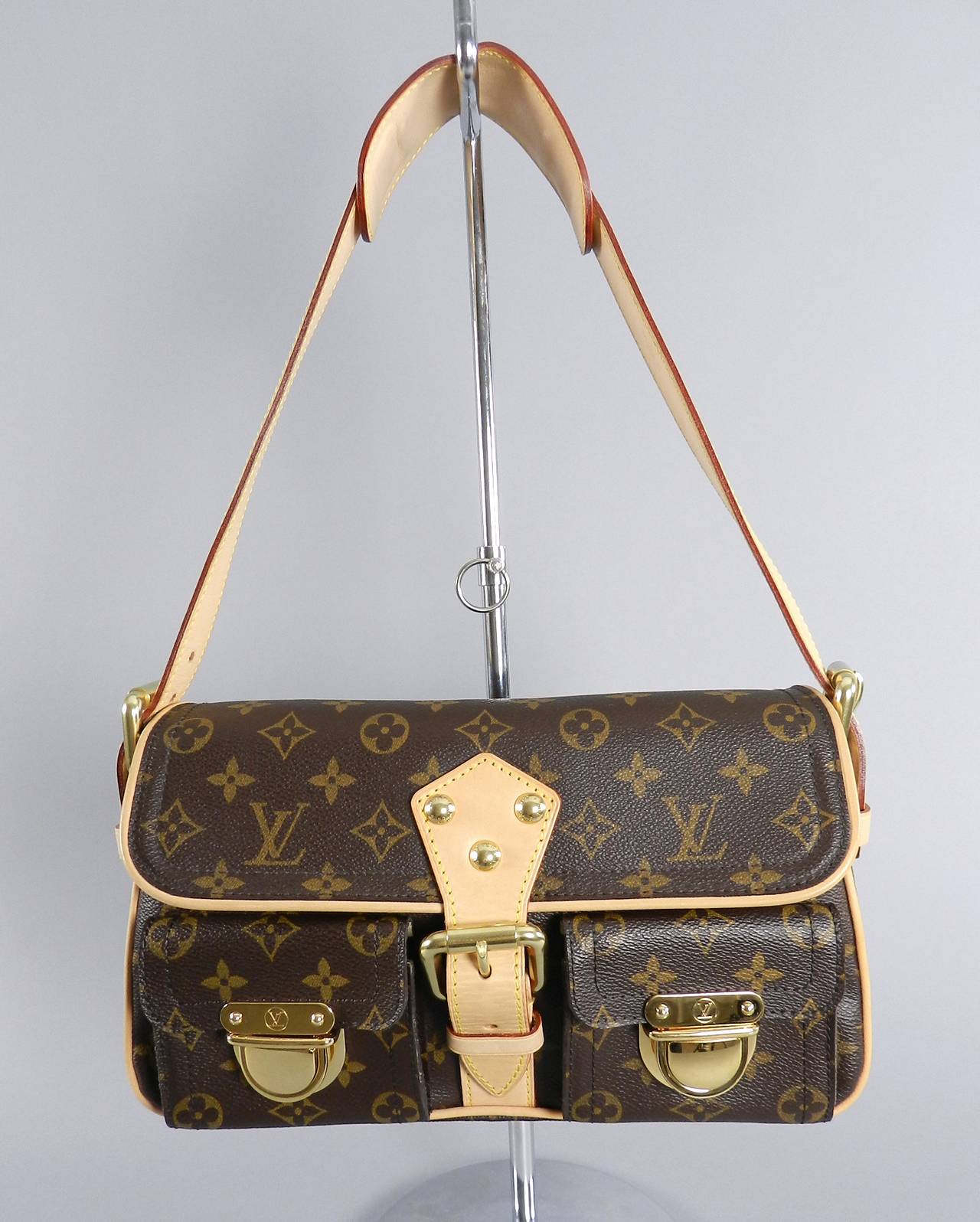 Louis Vuitton Hudson monogram shoulder bag. Previously owned but used only a few times. Excellent condition, original duster and paper card. Body of bag measures 12 x 6.75 x 4
