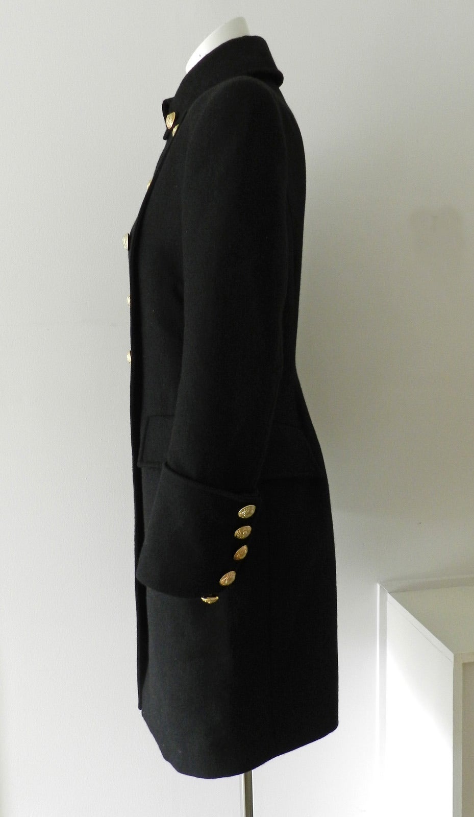 black military coat with gold buttons