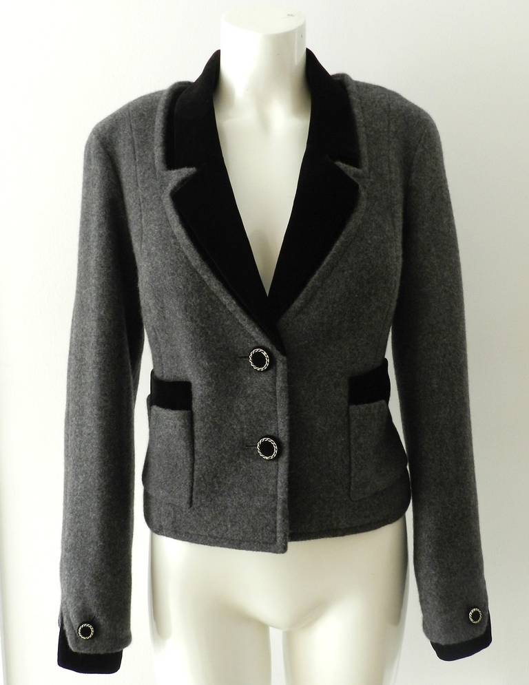 Chanel 2013 grey cashmere jacket coat with black velvet collar and inset. Unworn condition. With tags and original price of $6650+. Size 38.

Shipping prices provided are for FedEx Ground to the USA. For Canada, International, or faster priority