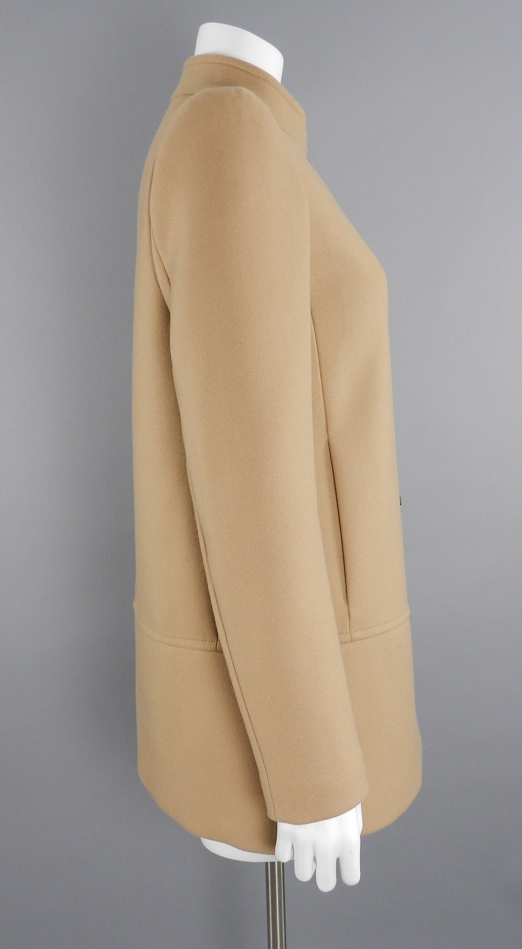 Proenza Schoulder camel wool coat with black snaps. Excellent condition - worn once. Original retail price tag of $2130 is included. Tagged size USA 4. Can fit a USA 4/6. To fit 34/35