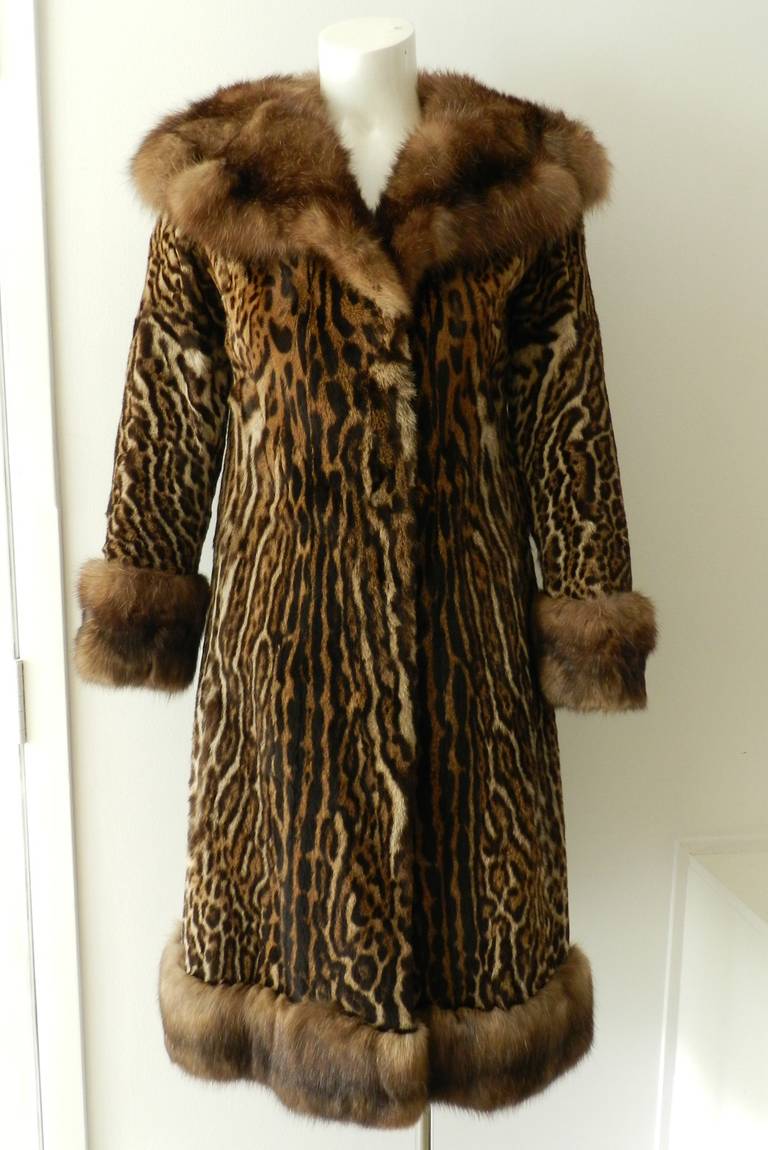 Vintage Christian Dior ocelot and sable fur trim coat.  Circa late 1960's / early 1970. Excellent condition - has been properly stored in high-end fur cold storage for decades. Size USA 0/2 - XS. Shoulder seams 14