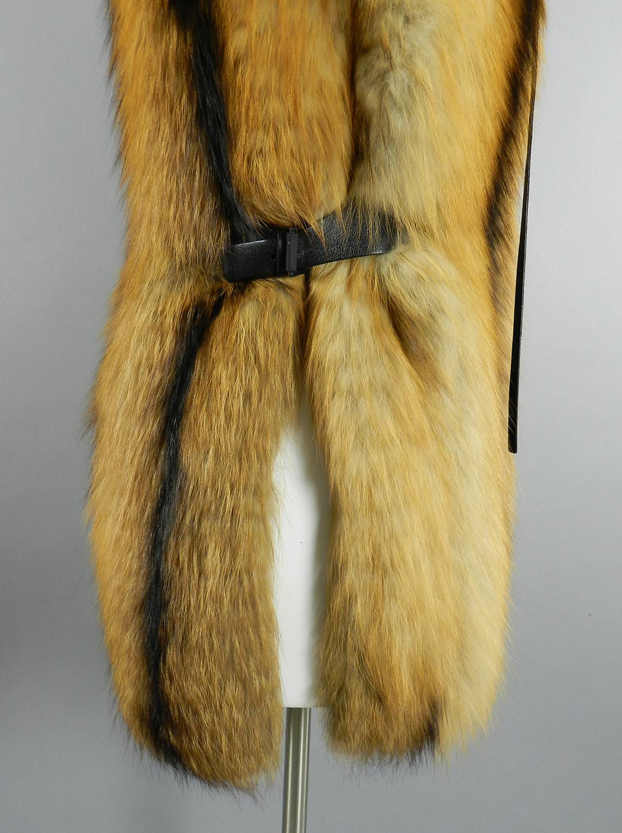 fur vest with leather sleeves