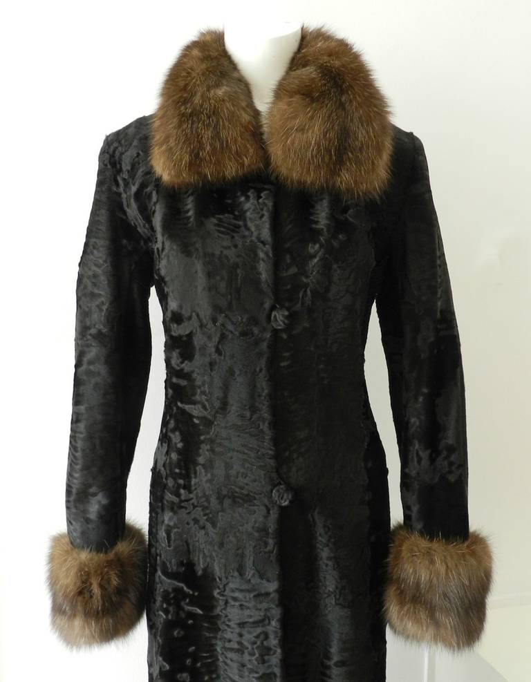 Fendi broadtail lamb and sable fur coat. Excellent previously owned condition. Just drycleaned and ready to ship. Size FR 38 (USA 4/6). To fit 34