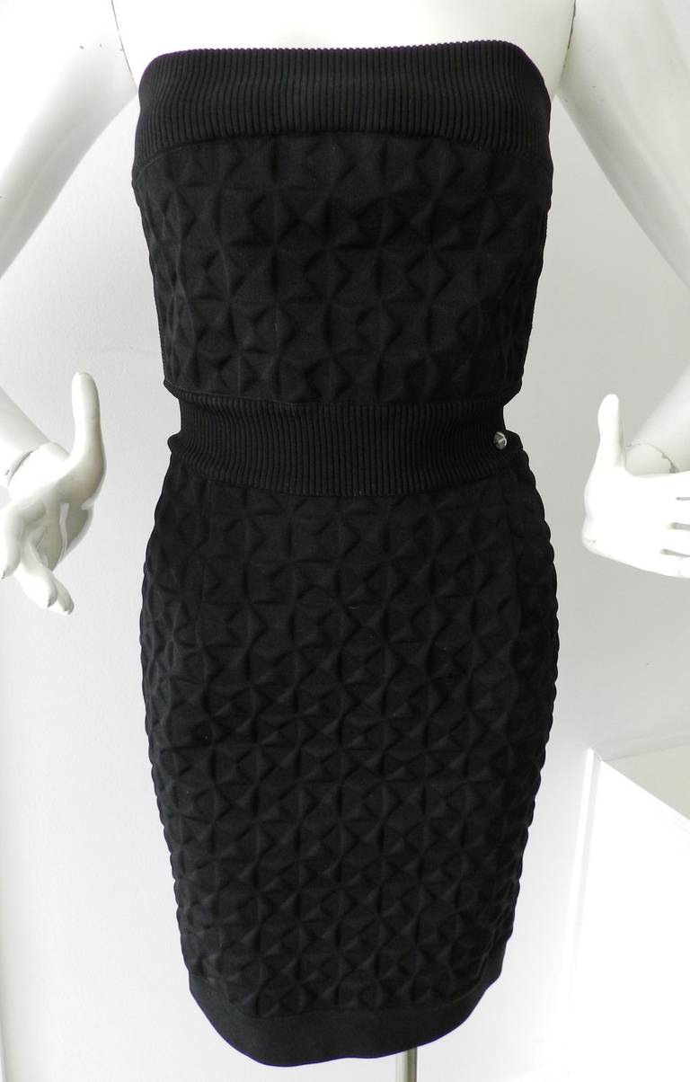 Chanel 2013 Spring collection black geometric textured tube dress. Hidden centre back zipper, stretchy ribbed trim, rigid textured body. Tagged Size FR 34 USA 0/2) to fit 32