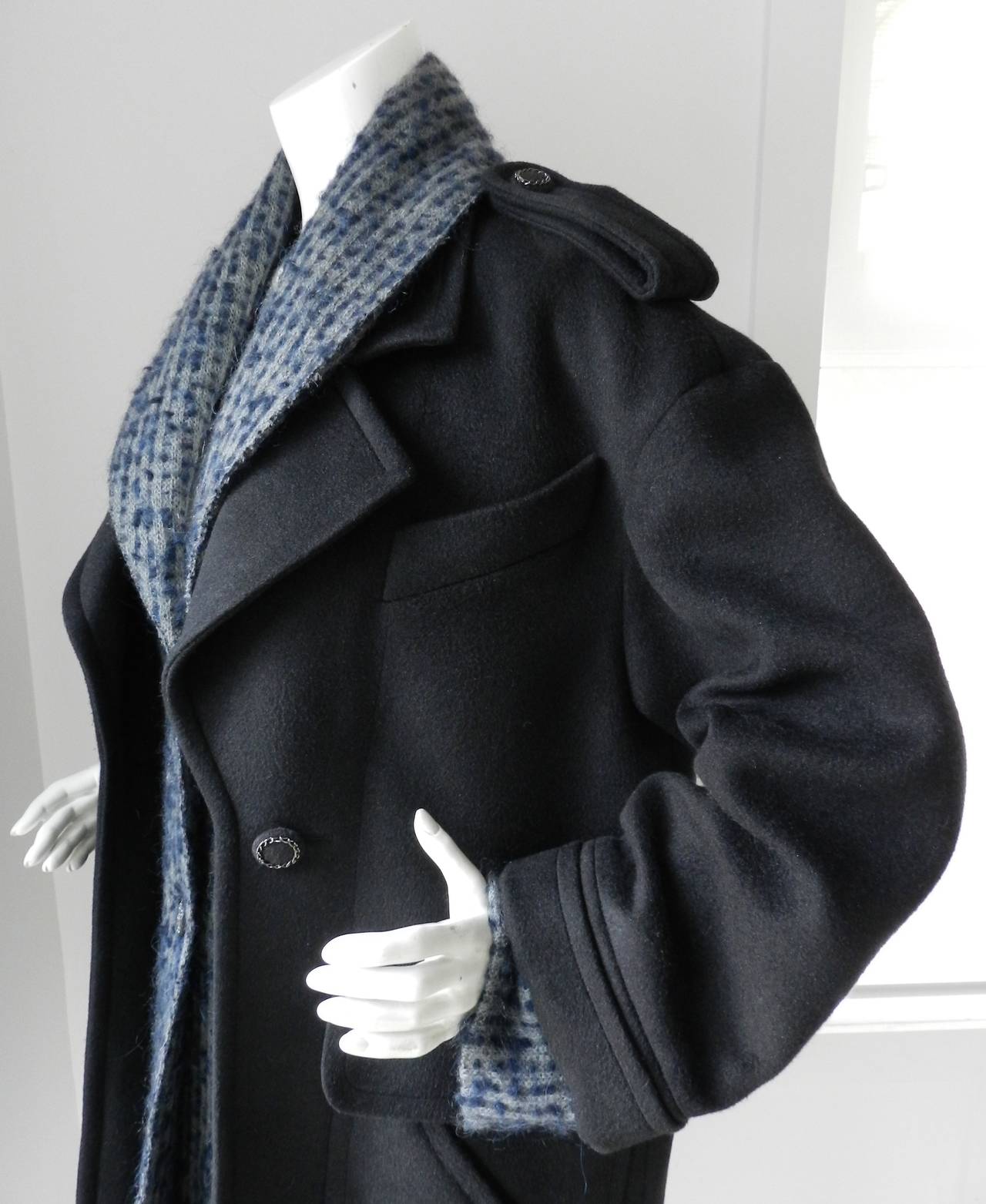Chanel 2013B black silk (feels like cashmere) coat with grey/blue knit inset. Tagged size 38 (USA 6) with a loose oversized cut so can fit larger. Actual garment bust is 46