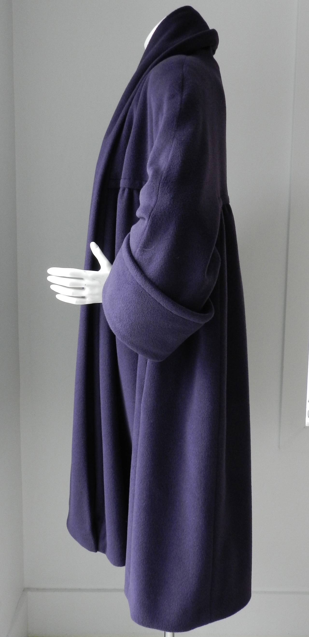 Vintage 1991 (Season 26) Chanel purple swing coat. 50% angora and 50% wool. Excellent vintage condition. Tagged size FR 36 (USA 6), but worn oversized and can fit larger (can fit USA 8-12). Back neck to hem is 40