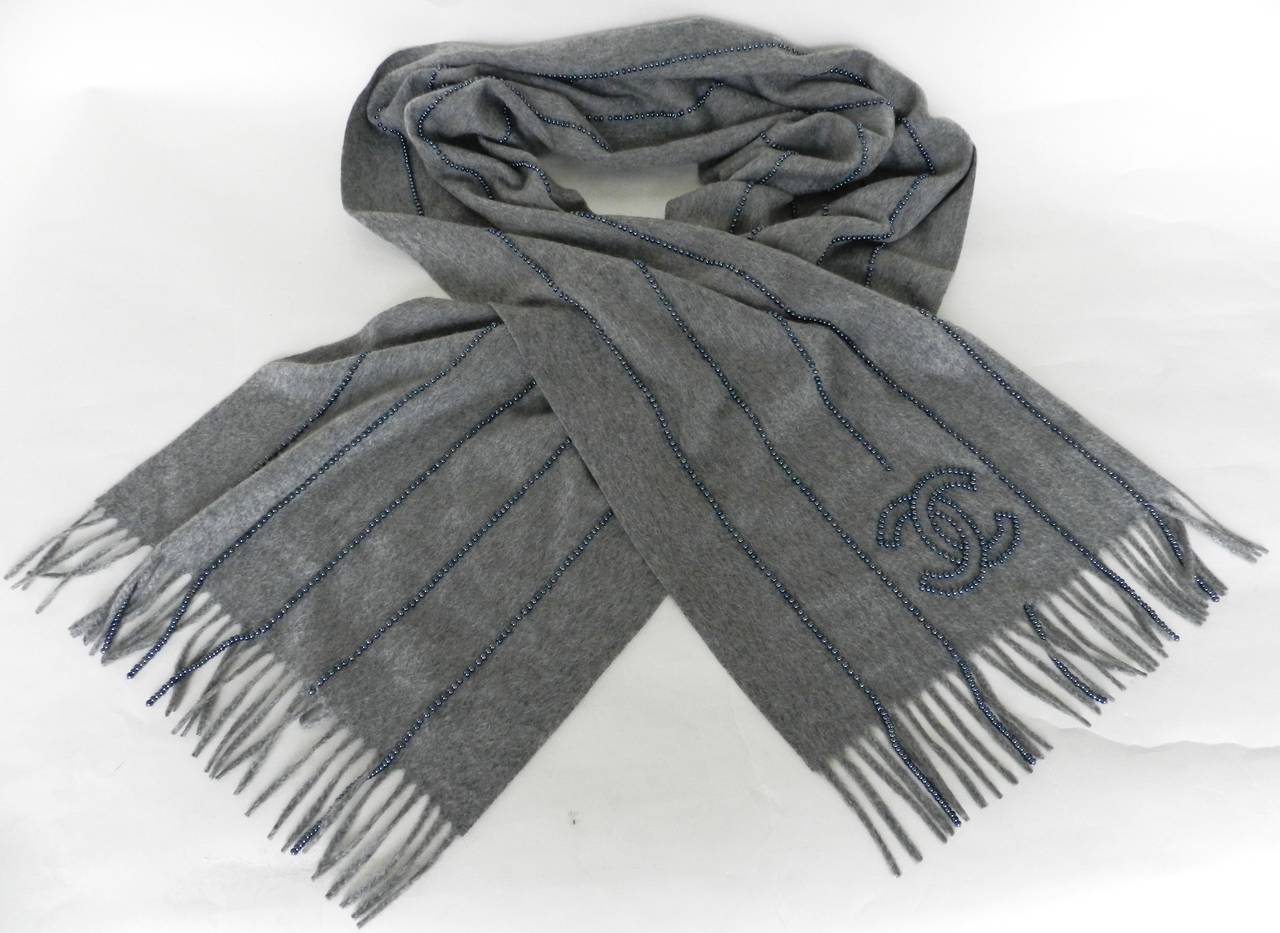 Chanel dove grey soft cashmere long scarf with beaded detail. Excellent condition. Hematite glass beads. Measures 14