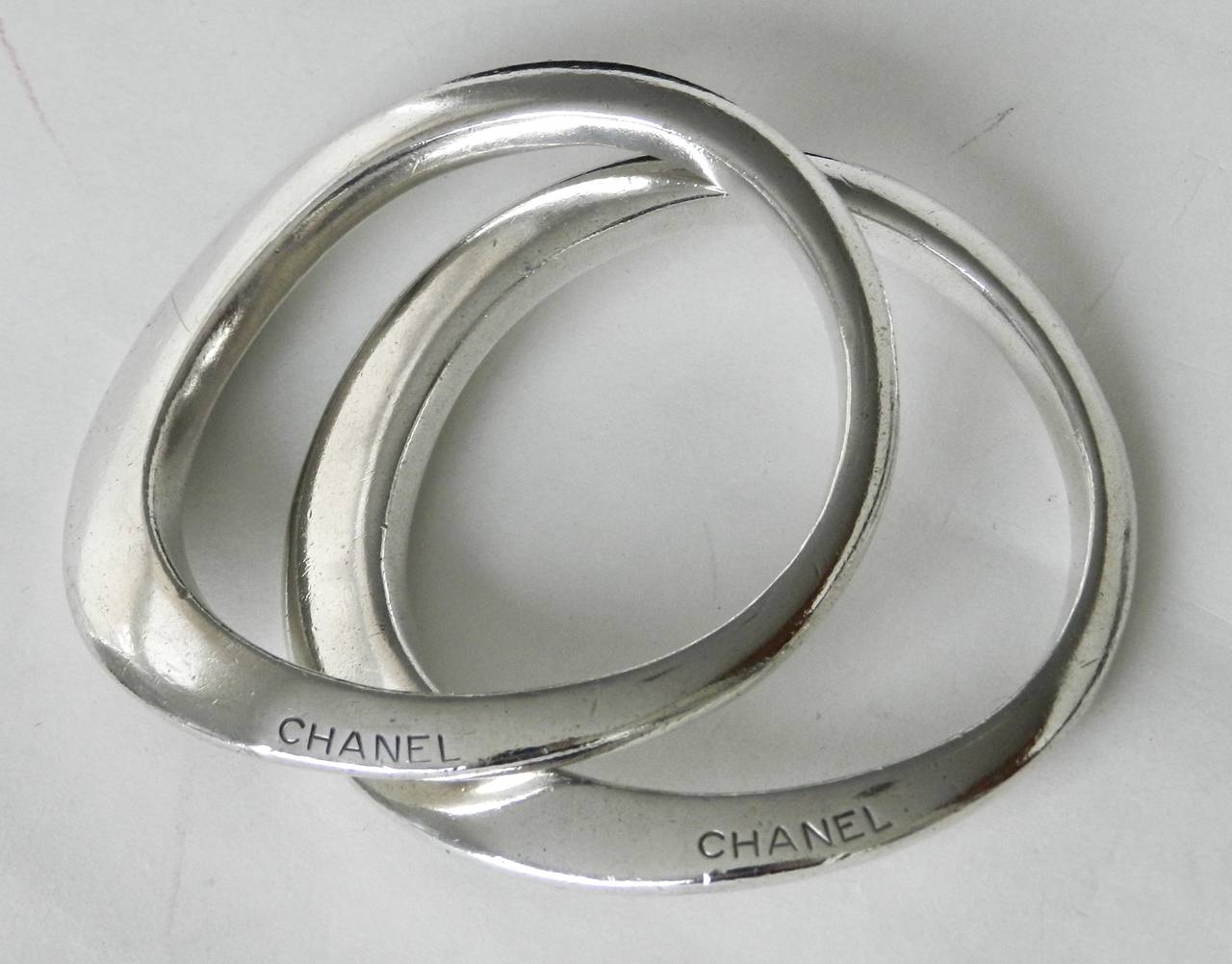 Two Chanel Sterling Silver Curved Bangle Bracelets at 1stDibs