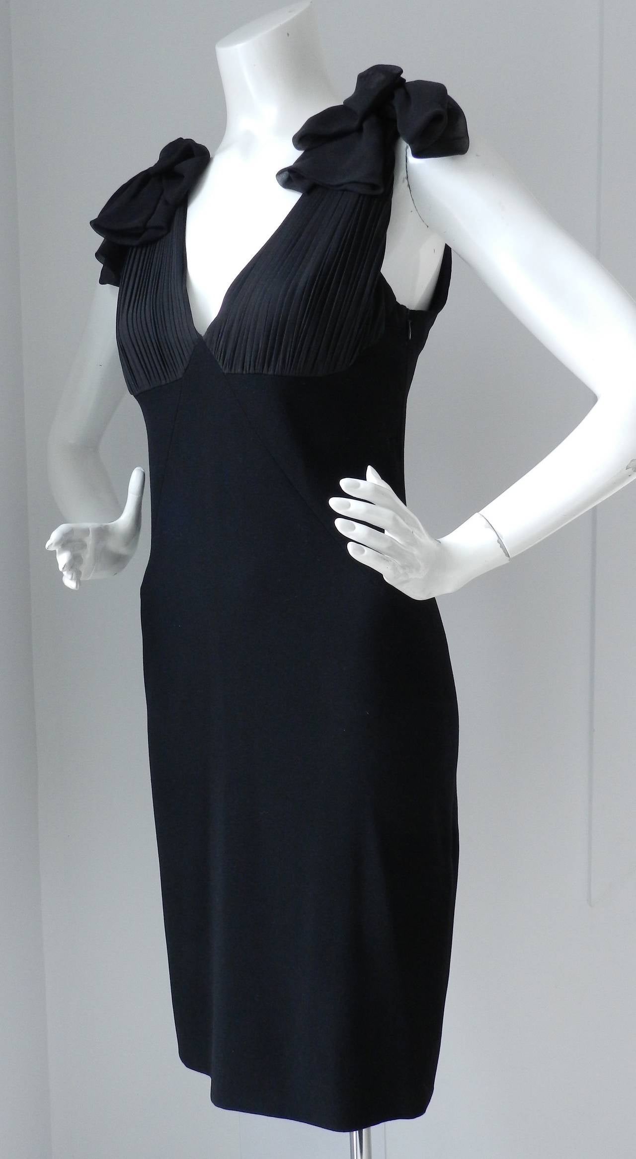 Balenciaga black cocktail dress with pleated sheer bodice and bow detail. Excellent condition - original retail $1995. Tagged size FR 38 (USA 6, but measurements can fit an 8). Bust to fit 34/35
