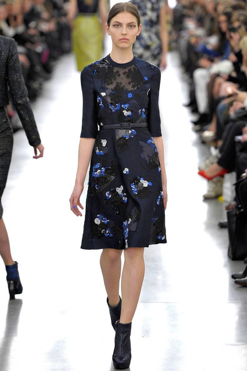 Erdem Fall 2012 runway navy dress. Floral embroidered appliques, sheer lace neckline, and patent embroidered patches. Zippers up in back with invisible centre zipper. Excellent pre-owned condition - worn once. Tagged size USA 6, IT 42, EU 38, UK 10.