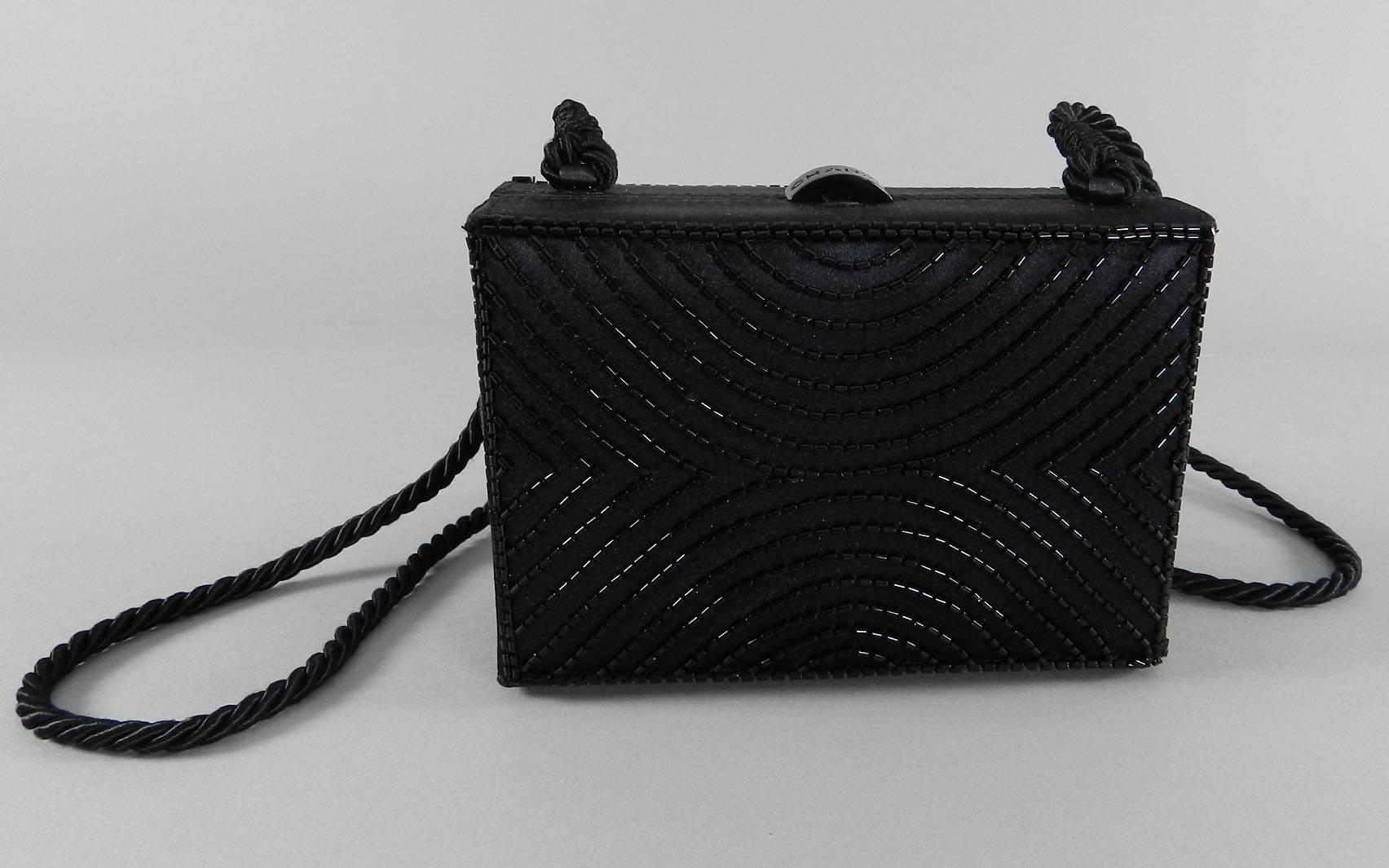 Chanel vintage small black satin beaded evening box bag. Long cross body cord strap. Date code for 1997-1999. Measures 6 x 4 x 2