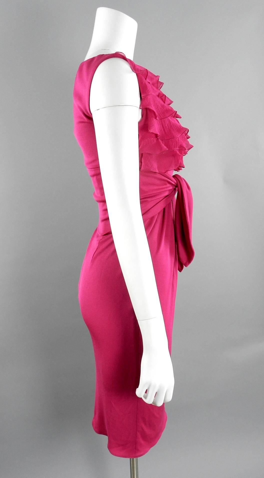 Giambattista Valli Fuchsia hot pink dress. Sheer silk chiffon ruffle detail at front chest with stretchy silk jersey body. Invisible side zipper and sashes tie at front waist. Excellent pre-owned condition. Tagged size IT 38 XXS (USA 0). To fit