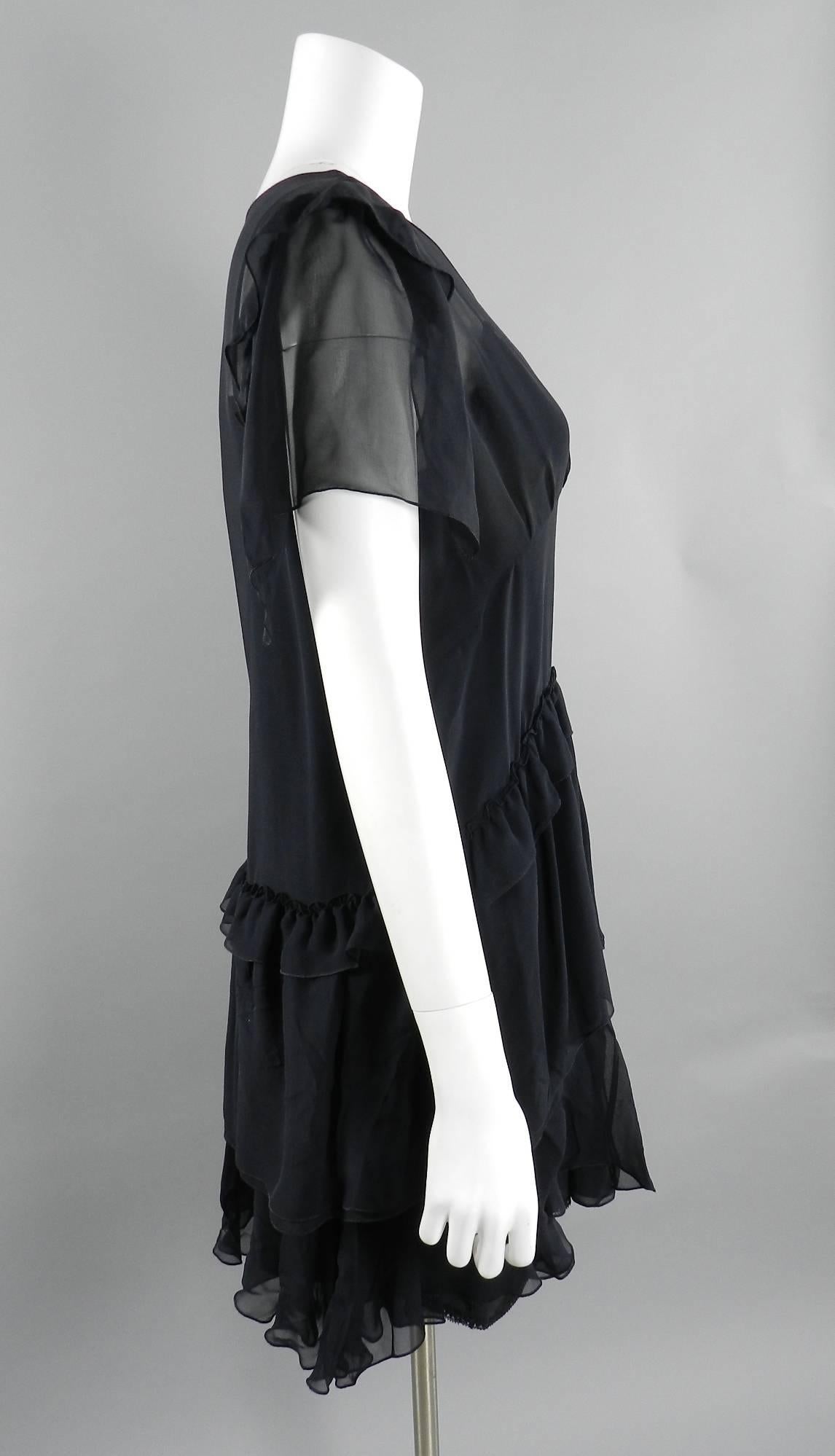 Miu Miu Black sheer silk 1920's inspired dress.  Straight cut body with ruffled skirt and matching black silk slip dress.  New with tags. Marked size IT 44 (about USA 8). To fit 35