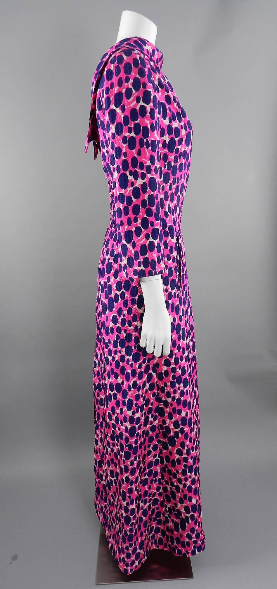 Vintage 1970’s Givenchy Haute Couture silk dress with graphic hot fuchsia pink and navy pattern.  Lined with hot pink silk fabric. Label is numbered. Approximately a modern USA 8 / 10. Garment measures 38” at bust and is recommended for a 36” bust