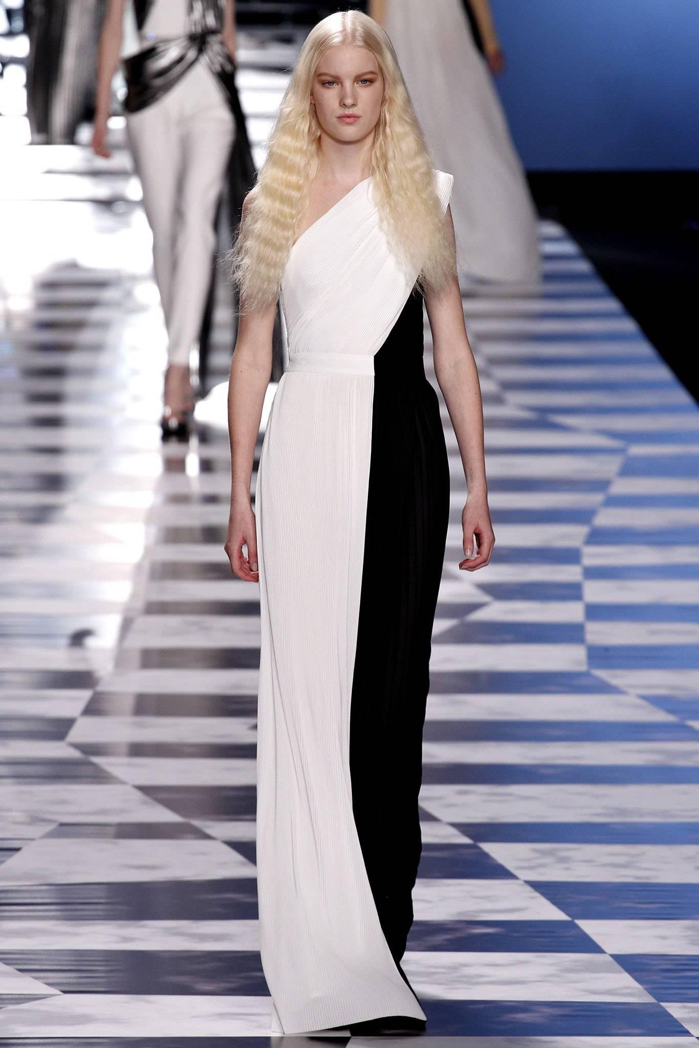 Viktor and Rolf Spring 2013 runway black and white one shoulder pleated gown. Invisible side zipper, fully lined, padded shoulder. Tagged size IT 40 (to fit USA 4). Garment to fit 33 / 34