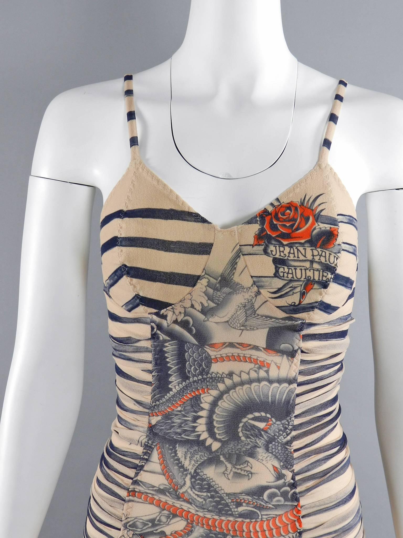 Jean Paul Gaultier mesh bodycon tattoo dress.  Sexy strappy design with sheer ruched sides and double lined front and back panels. Adjustable thin shoulder straps. Tagged size M.  Can also fit a size small as it is very stretchy but best for about a