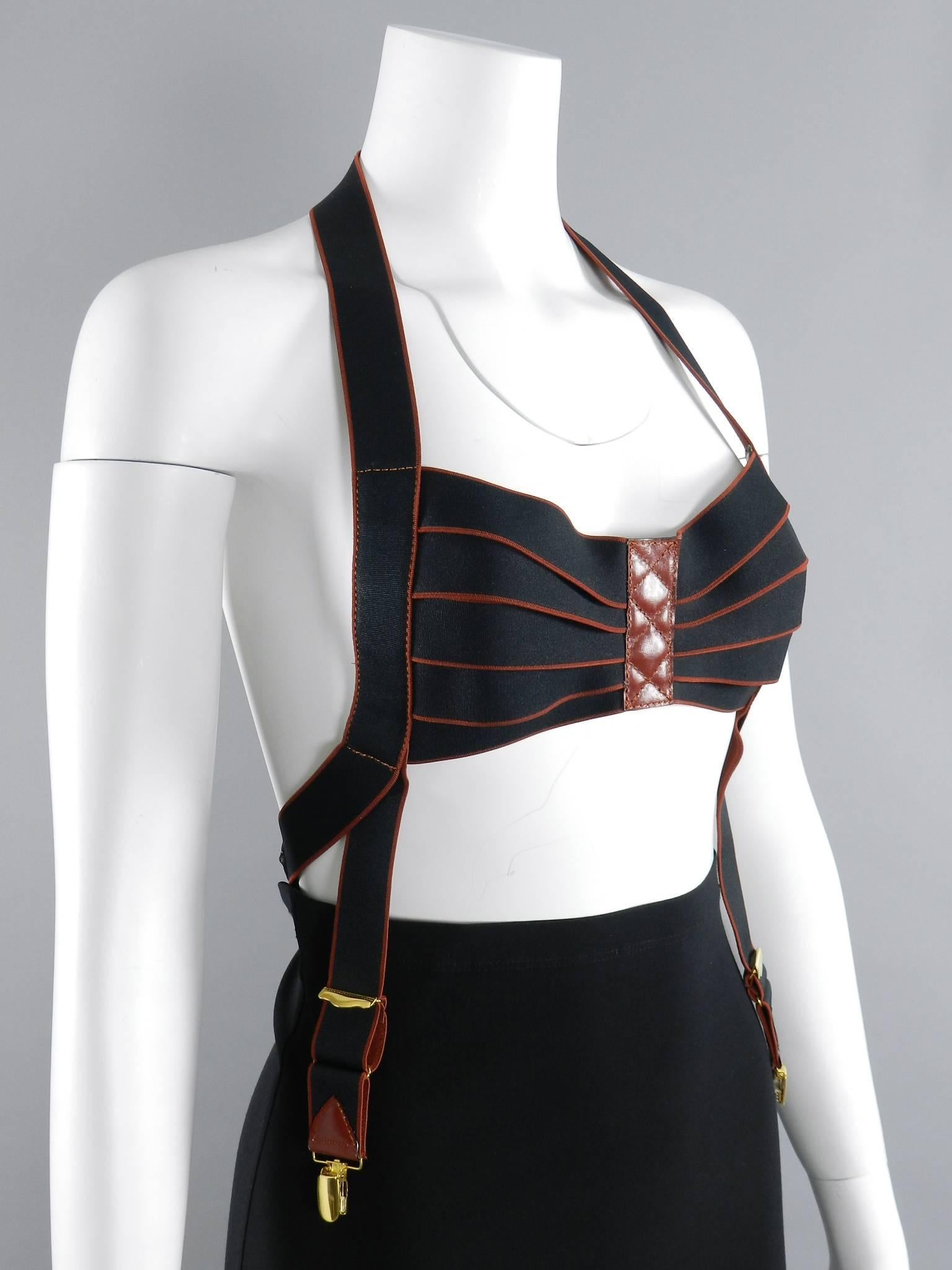 Jean Paul Gaultier vintage 1980’s black and rust bandage bra suspenders. Backless design.  Free size but best as a Small or smaller medium. 

We ship worldwide.
