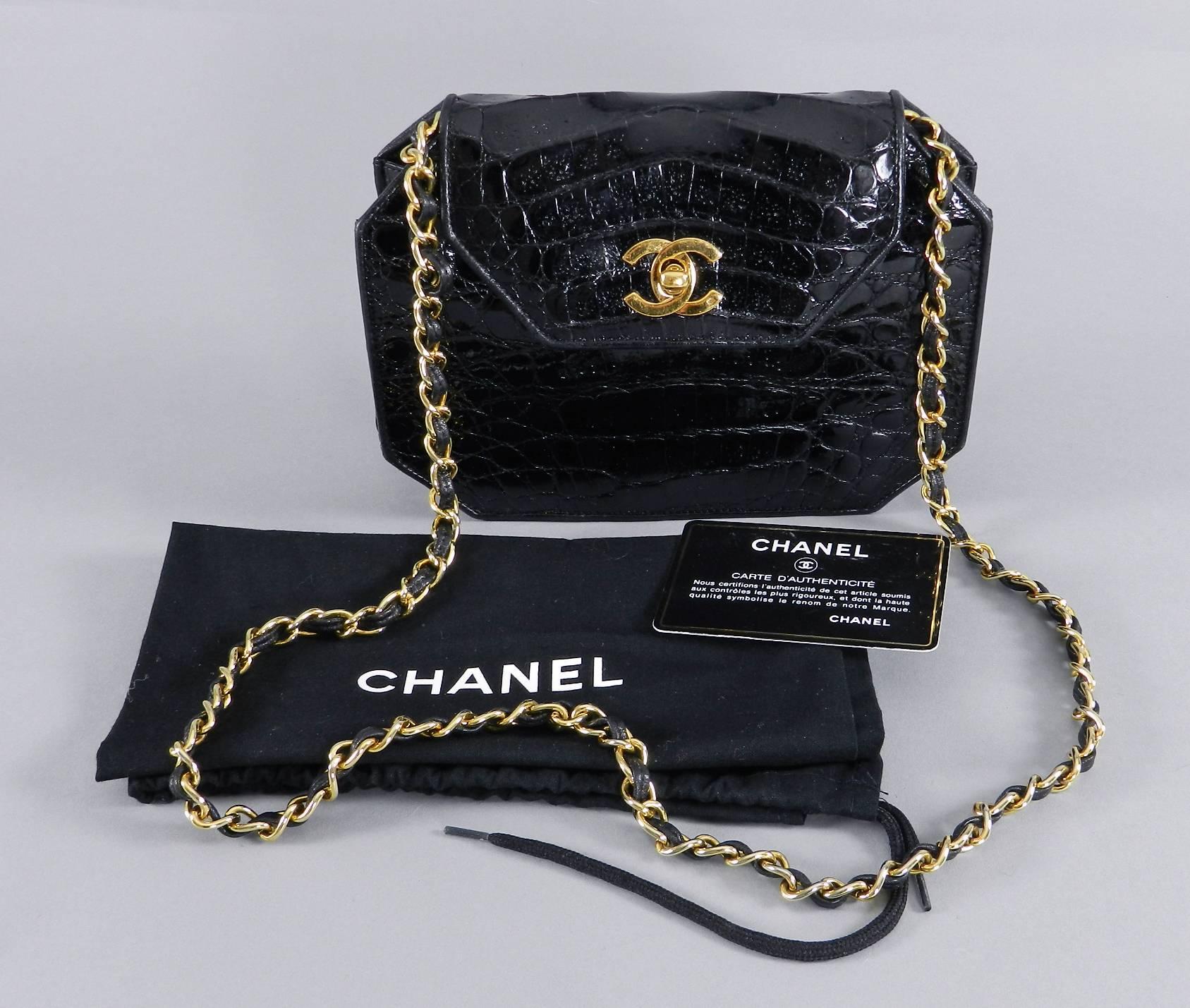 Chanel black crocodile octagonal purse with chain strap. Goldstone hardware with CC logo at front. Comes with original authenticity card and duster. Date code is 11 series for year 2006-2009.  Body of bag measures 7.5