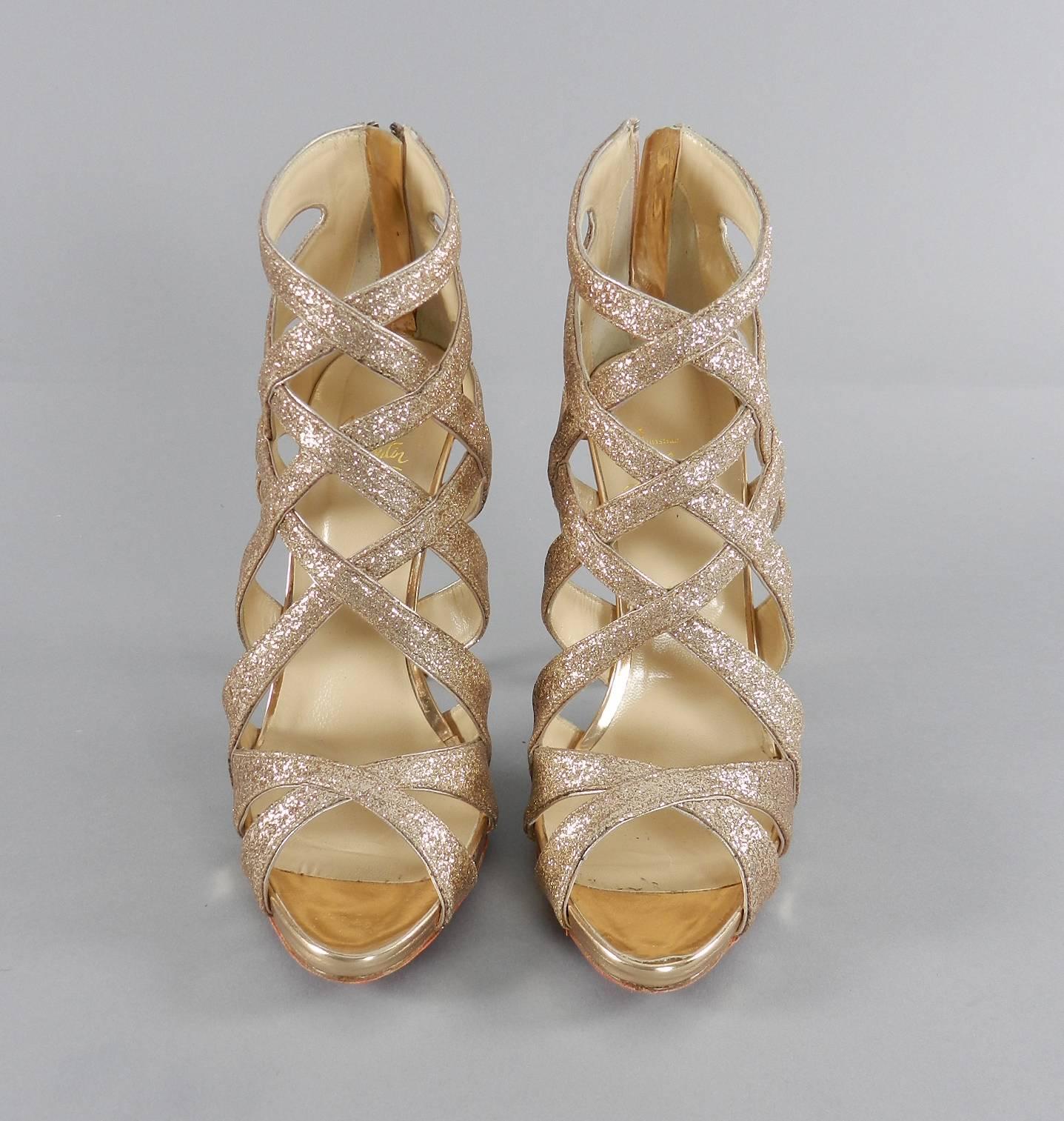 Christian Louboutin Balota gold glitter gladiator heels. Anti-slip gips have been put on bottom - new unworn.  Marked size 41. Heel is 4.75
