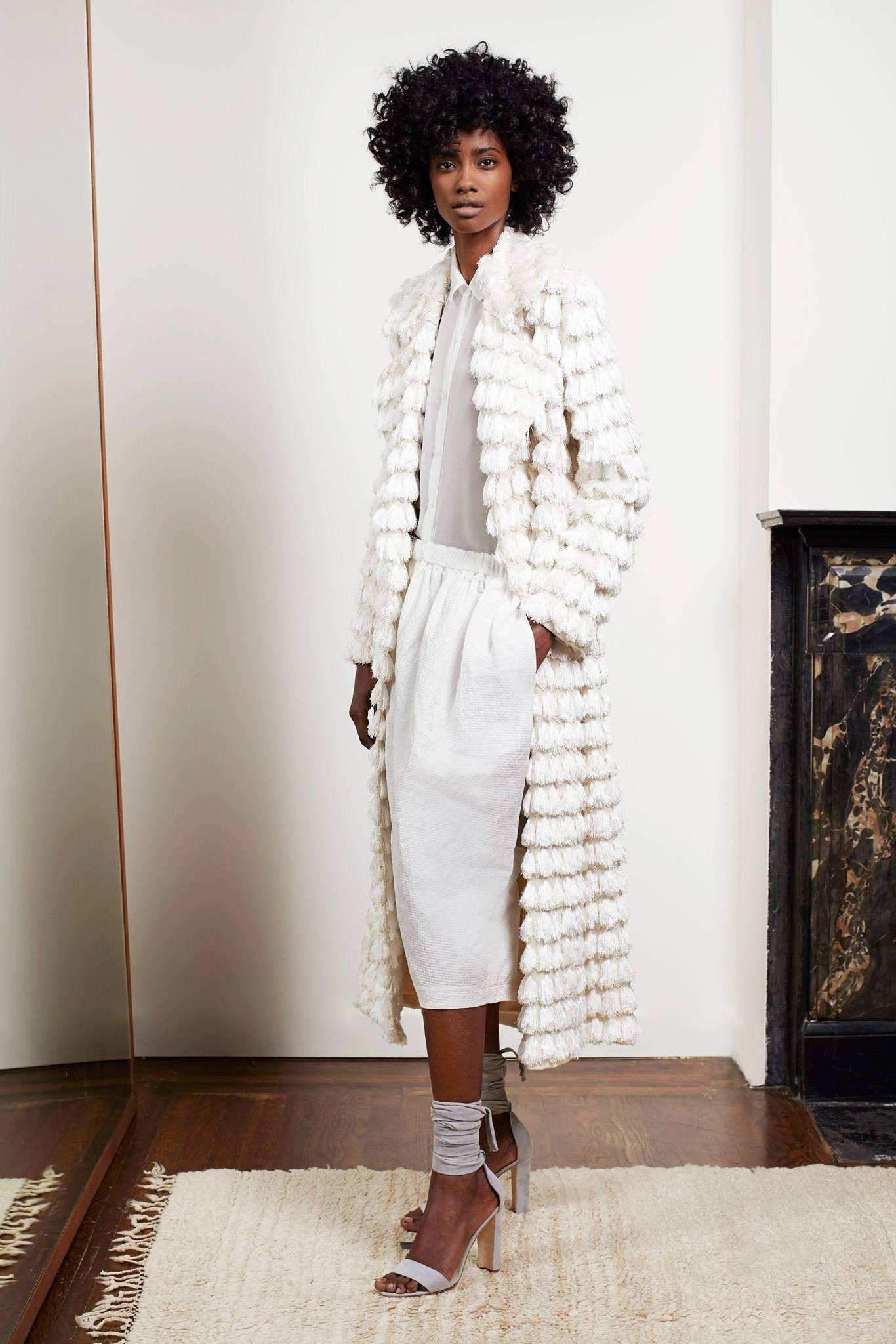 Adam Lippes cream Fringed Tassel coat.  New with tags. Original retail $12,725+. Spring 2015 collection. Tagged size USA 4 (best for taller person). Can also fit 6/8 as it is oversized. 47% viscose, 41% cotton, 12 poly. 100% silk lined, 100% rayon