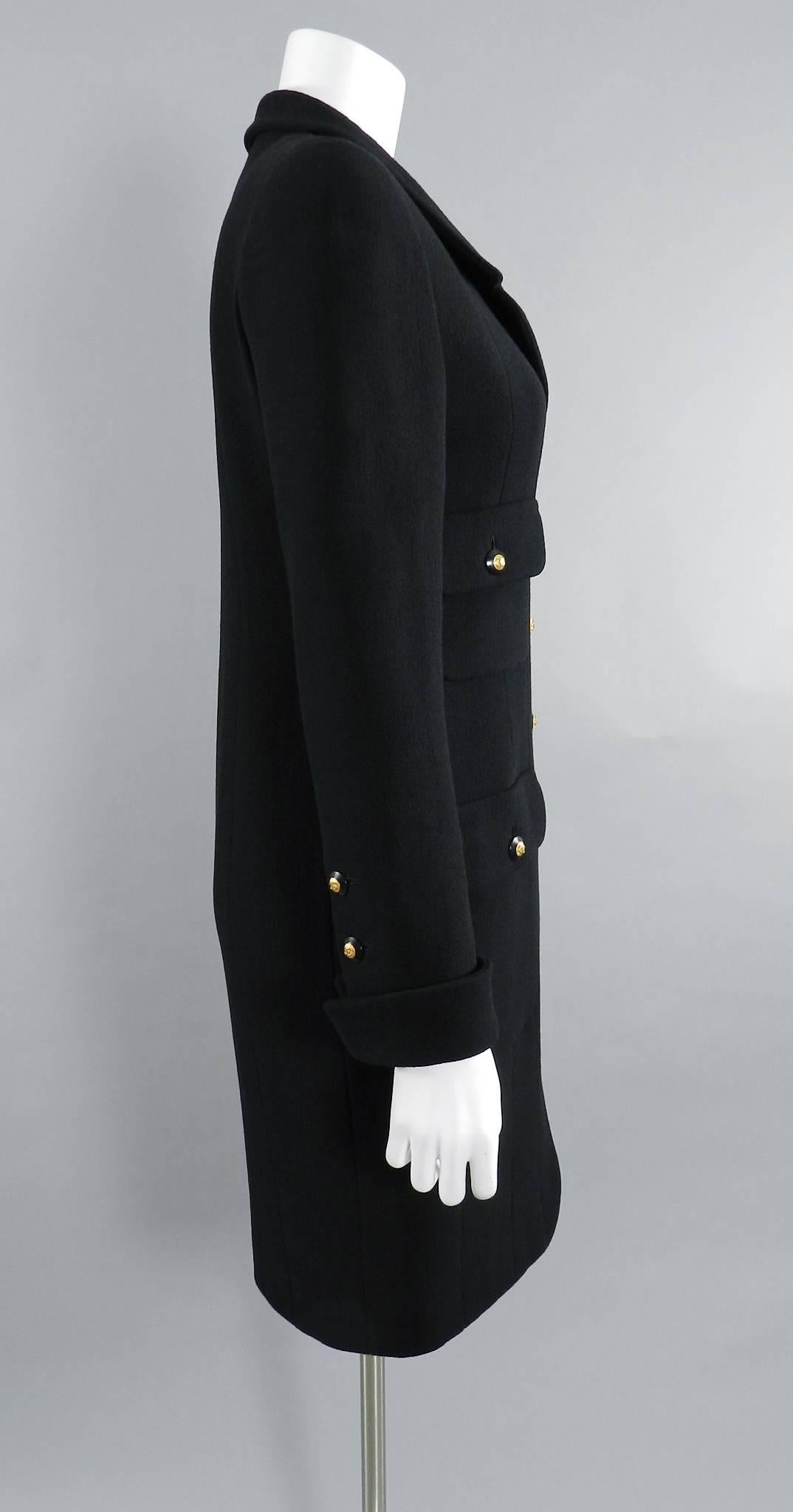 Chanel vintage 1993 fall runway collection black wool jacket. Very versatile item that can be worn as a jacket, dress, or coat. Excellent clean condition. 100% wool with silk lining.  Decorated with cc buttons and 4 front pockets. Tagged size FR 38