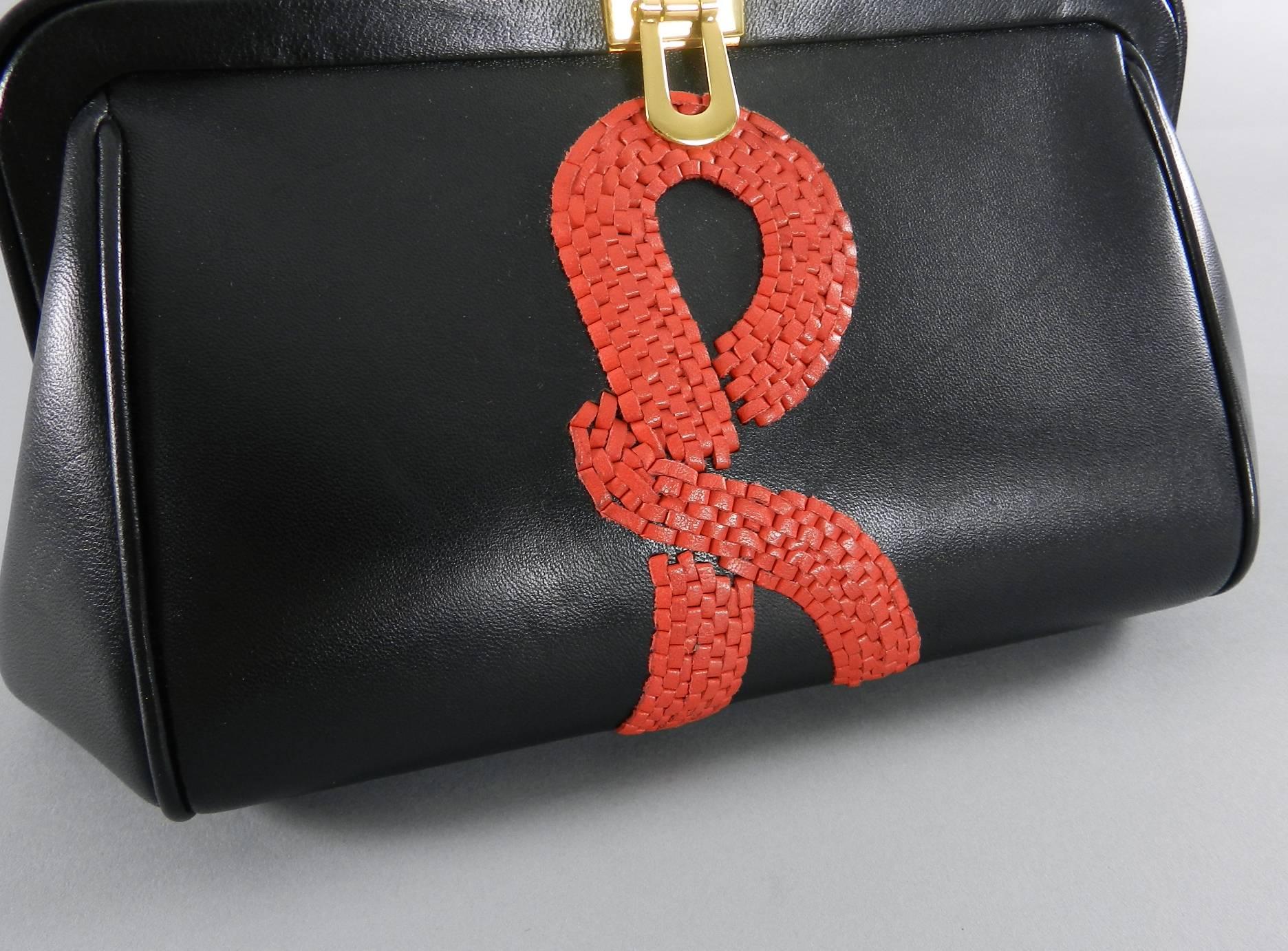 Black Roberta di Camerino vintage style leather bag with red Woven R logo