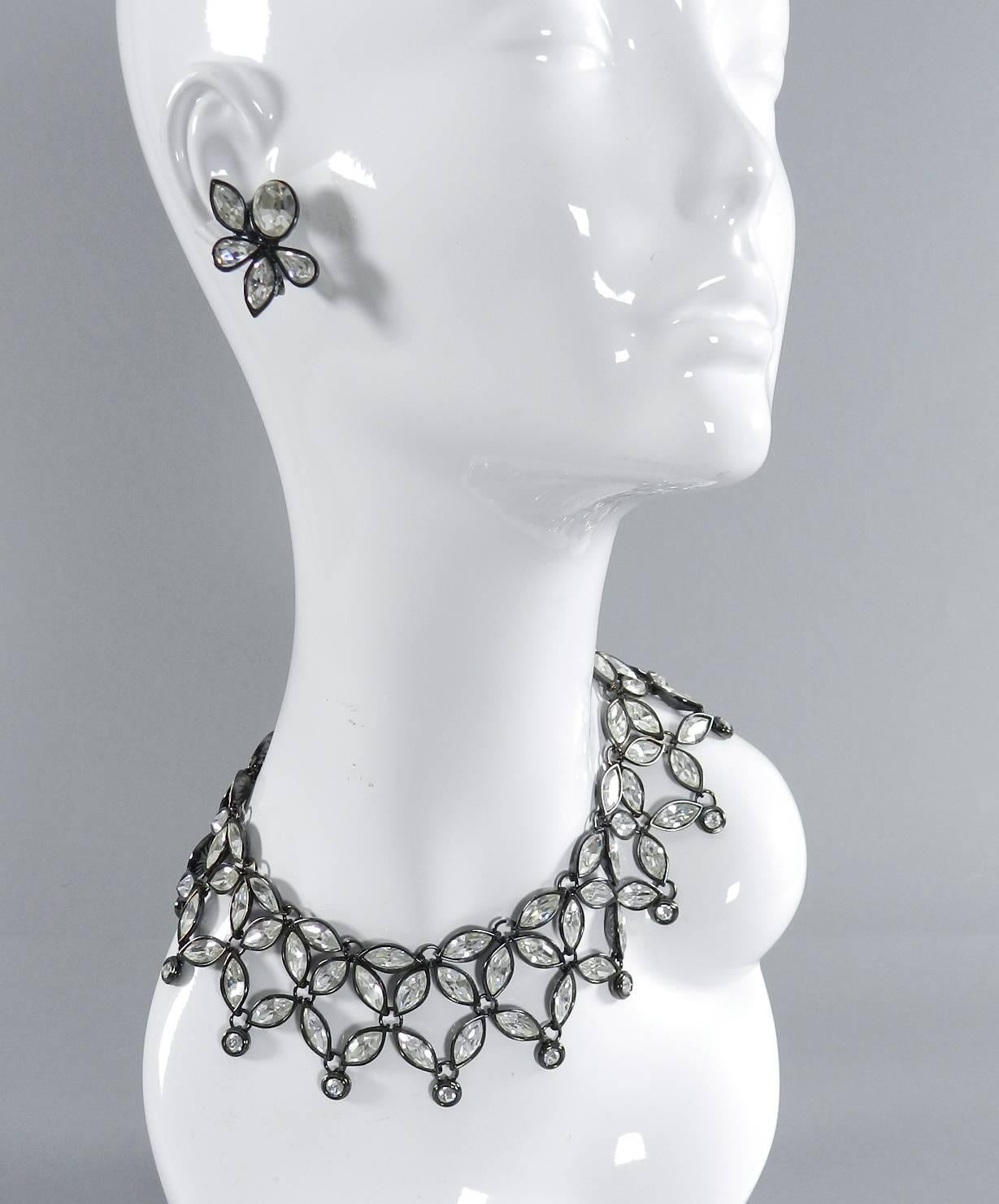 YSL Yves Saint Laurent Vintage Limited Edition Numbered Rhinestone Bib Necklace with matching earrings. Excellent vintage condition. Clear rhinestones set in dark gunmetal grey setting. Clip earrings. Collar necklace has an etched signed plaque wth