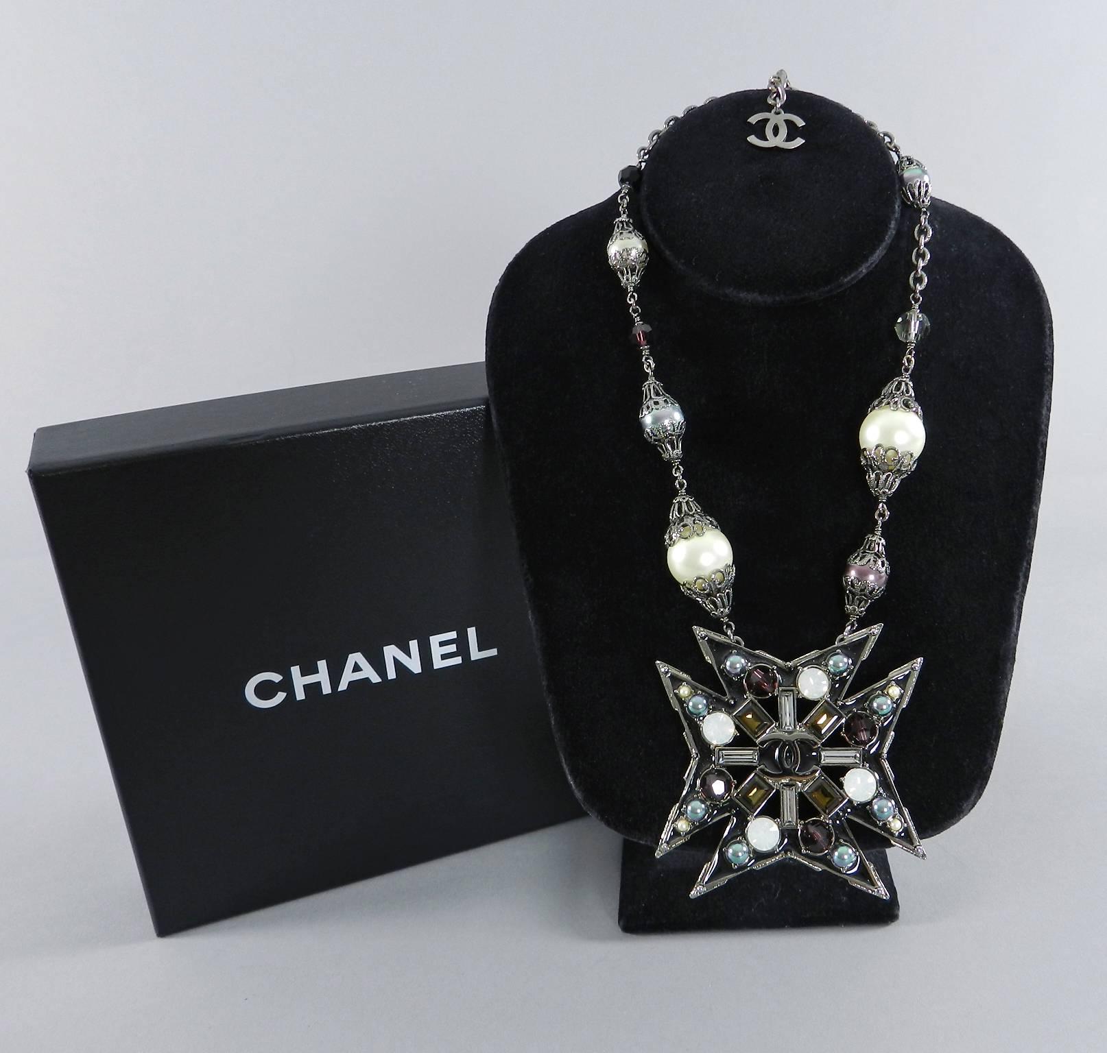 Chanel 2005 resort collection maltese cross necklace in box.  Faux pearls with filigree caps, purple glass beads, vaseline glass, and brown crystals set in dark gunmetal. Pendant measures about 2.75 x 2.75