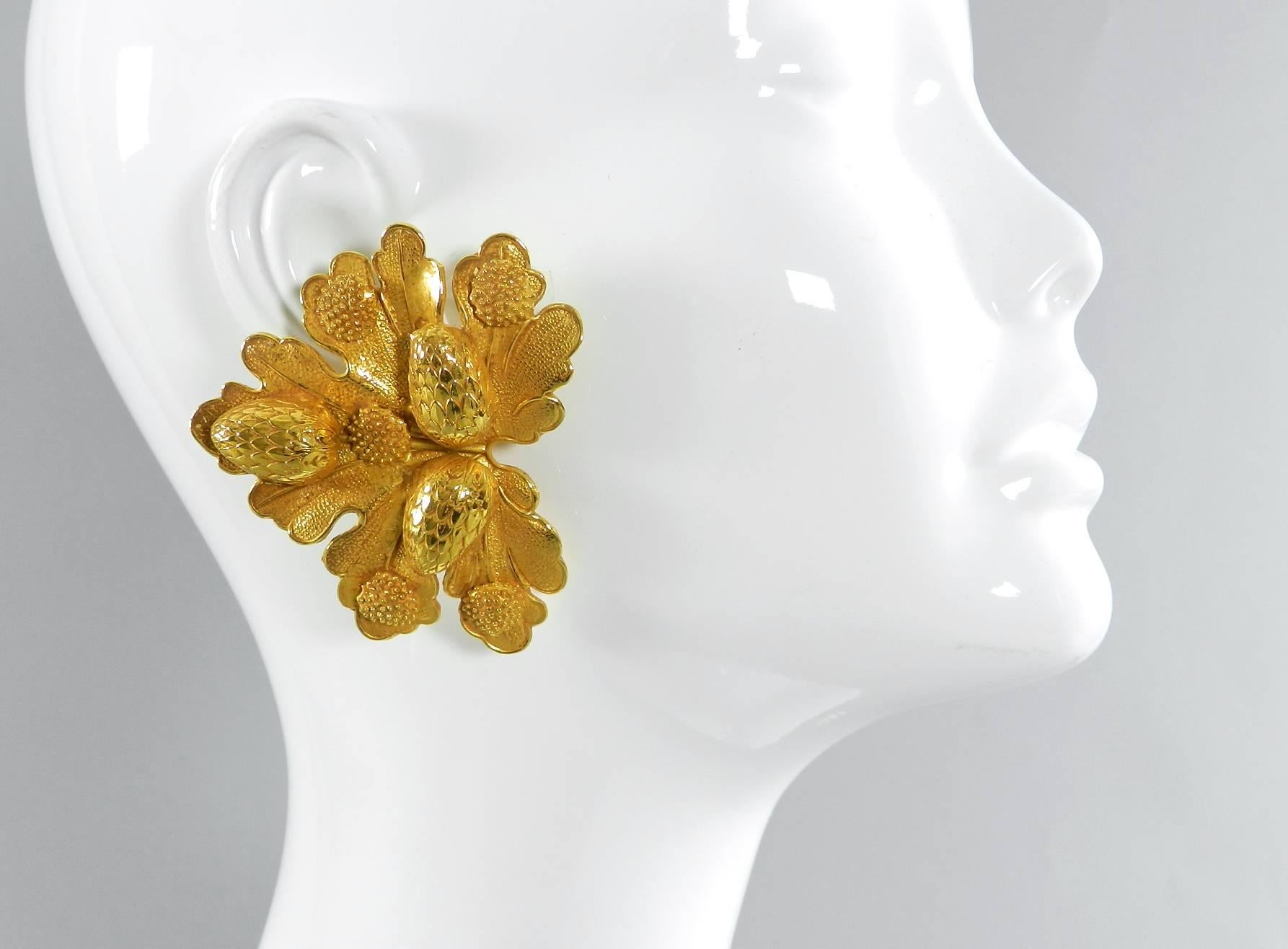 Vintage circa 1980's Dominique Aurientis large statement earrings. Leaf and berries design in gilt gold. Clip on. Measures about 2.75 x 2.5