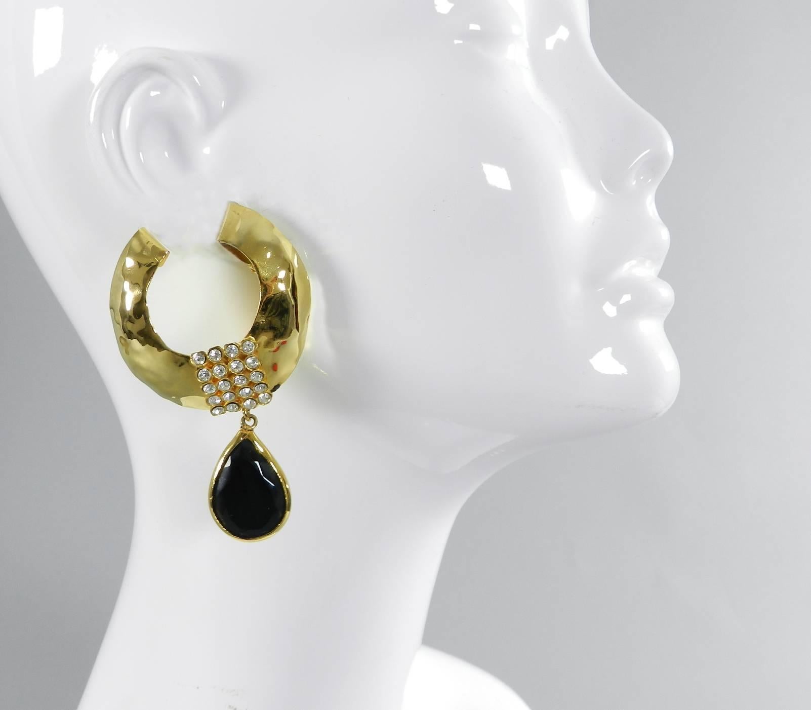 Vintage 1980's Valentino night huge statement clip on earrings with original box.  Crescent shaped clip-on earrings with clear rhinestones and larger black glass tear drop shaped drop. Excellent vintage condition. Each earring measures about