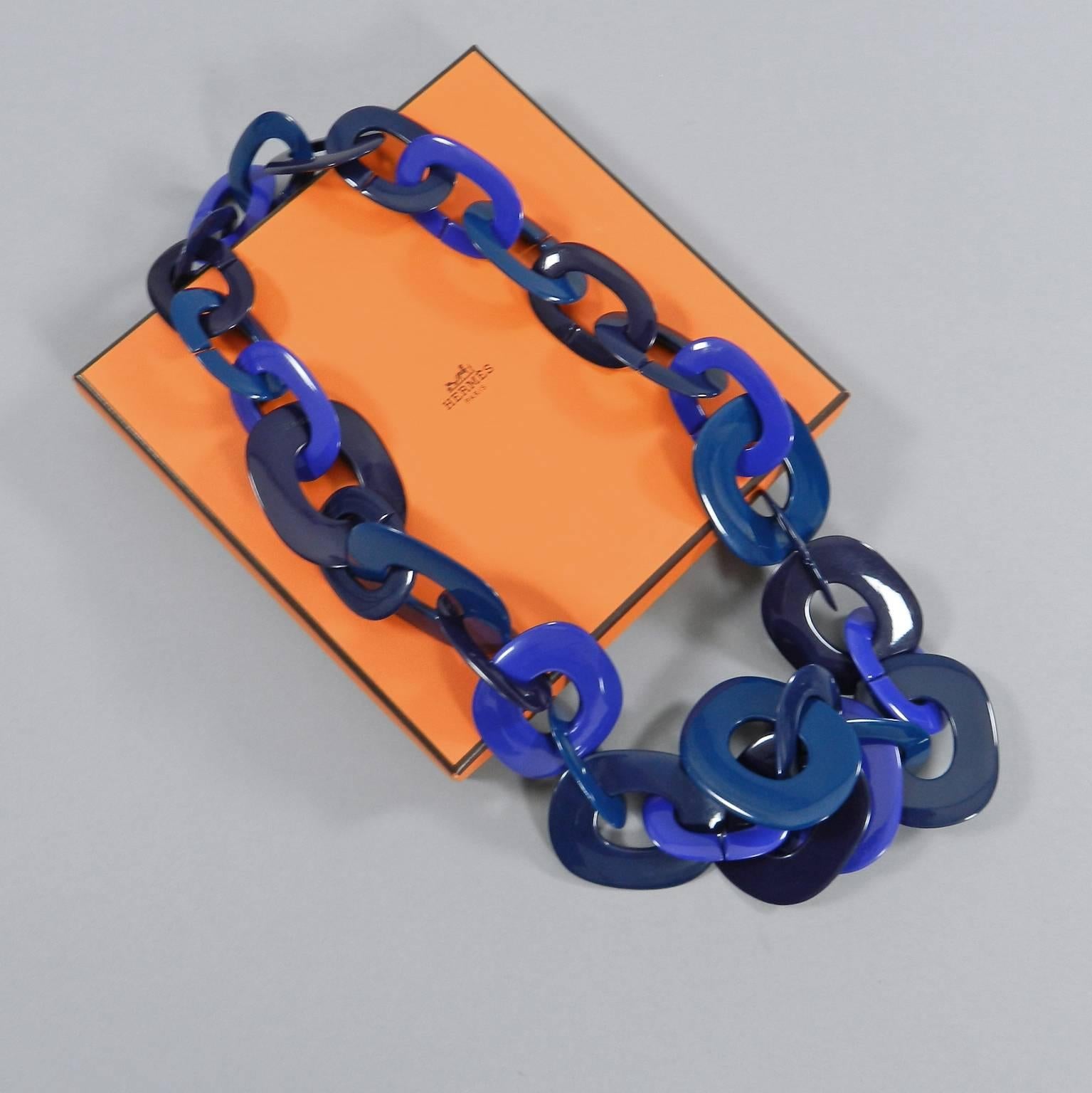 Hermes Isidore link necklace. Three shades of blue lacquer with pouch and box.  Interior circumference measures 26