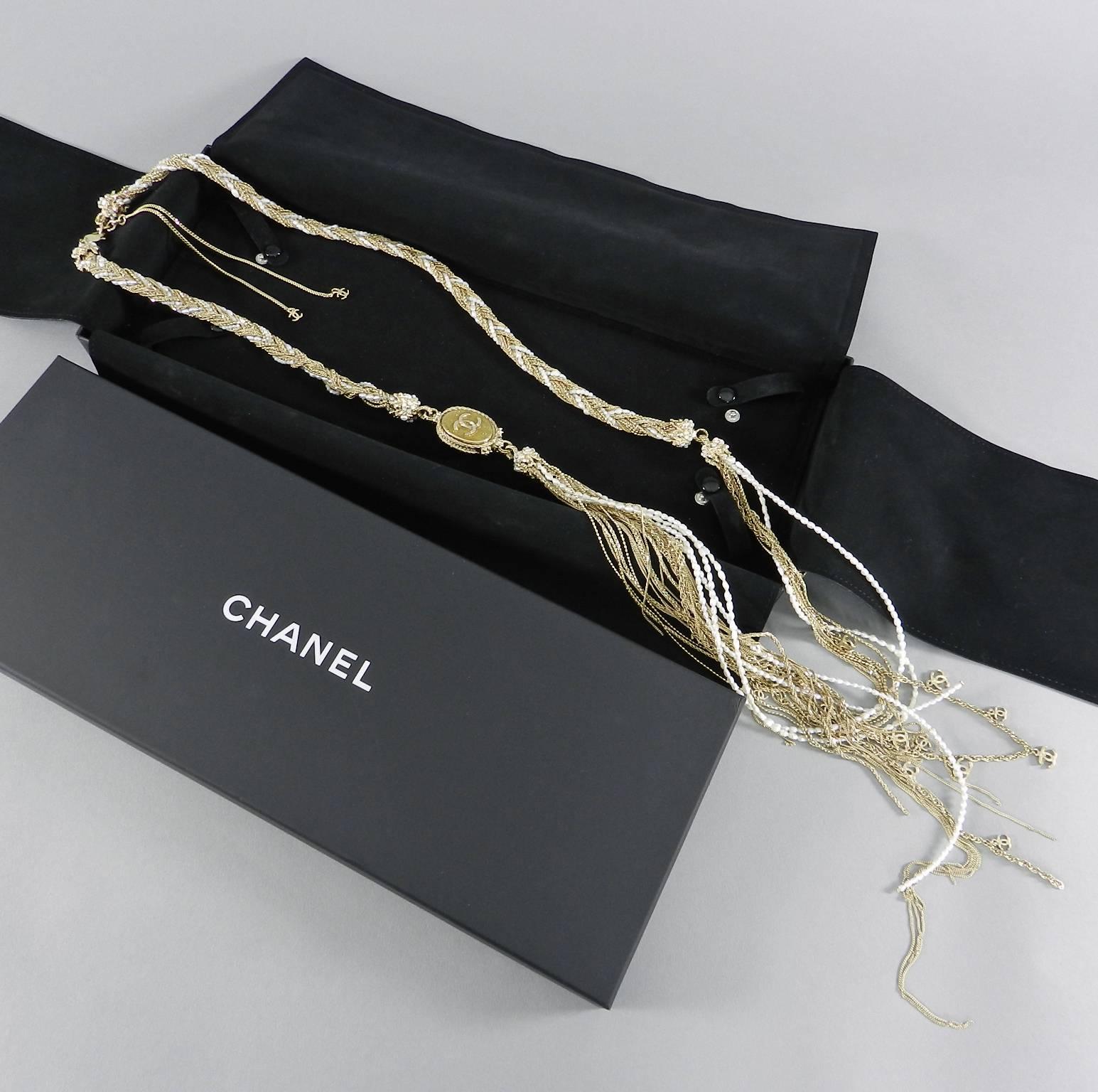 Chanel 2011 cruise resort colelction Gold and Pearl Braided Long Rope Necklace with Tassel.  Worn once - like new condition - with original box and storage pad. Necklace has a 24