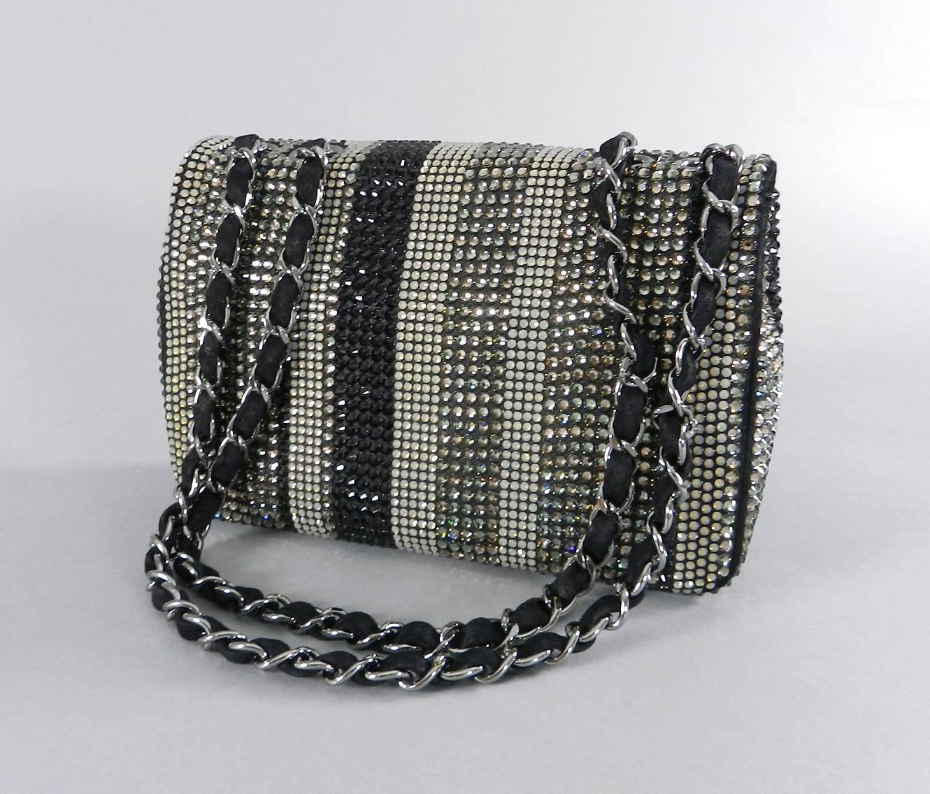 Chanel limited edition strass swarovski crystal embellished classic flap bag. Black suede body with classic chain strap.  Mini (rectangle) size measuring 8 x 5.25 x 2